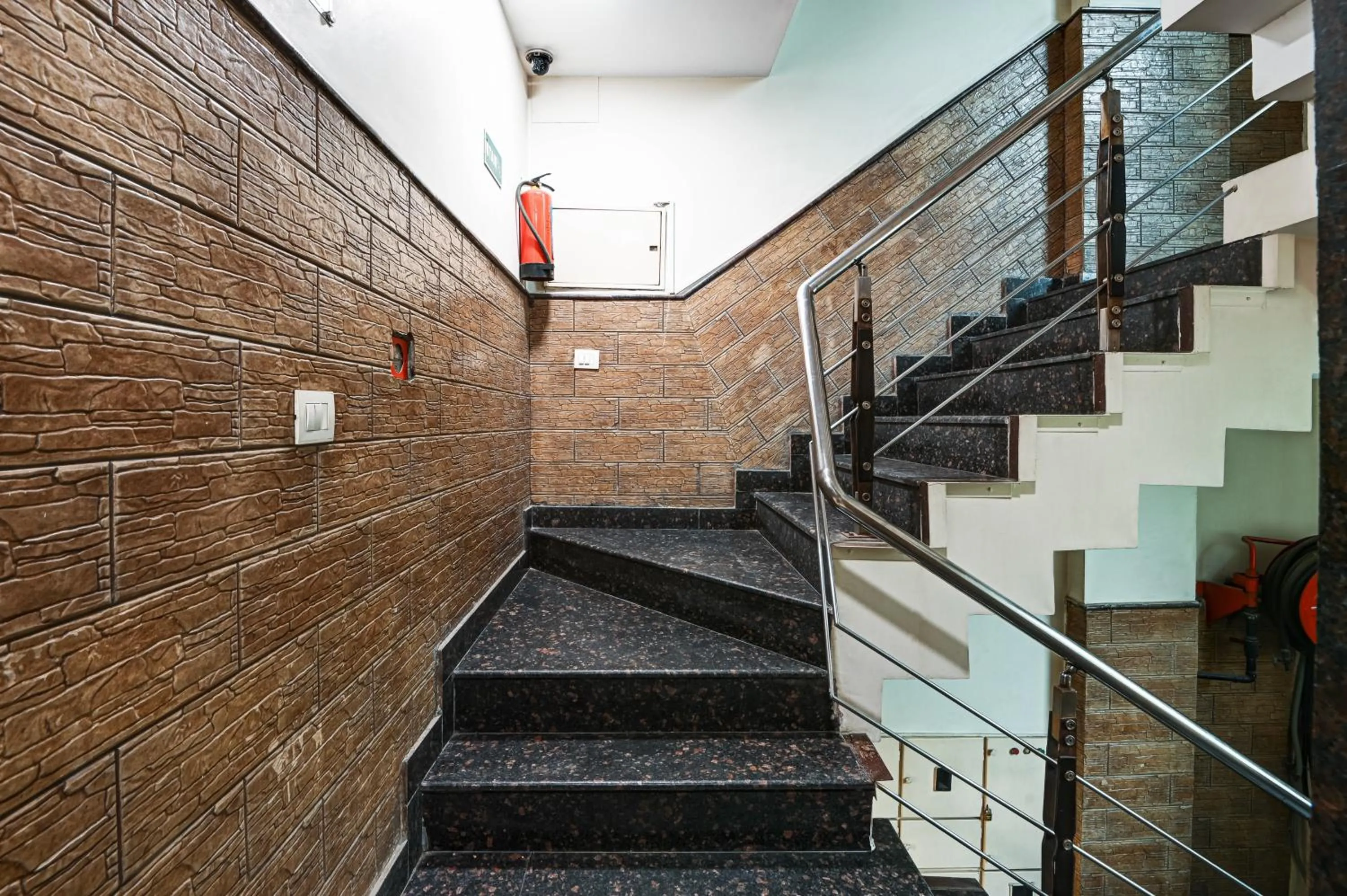 Lobby or reception in Hotel Amby Inn by Quadis - Lajpat Nagar