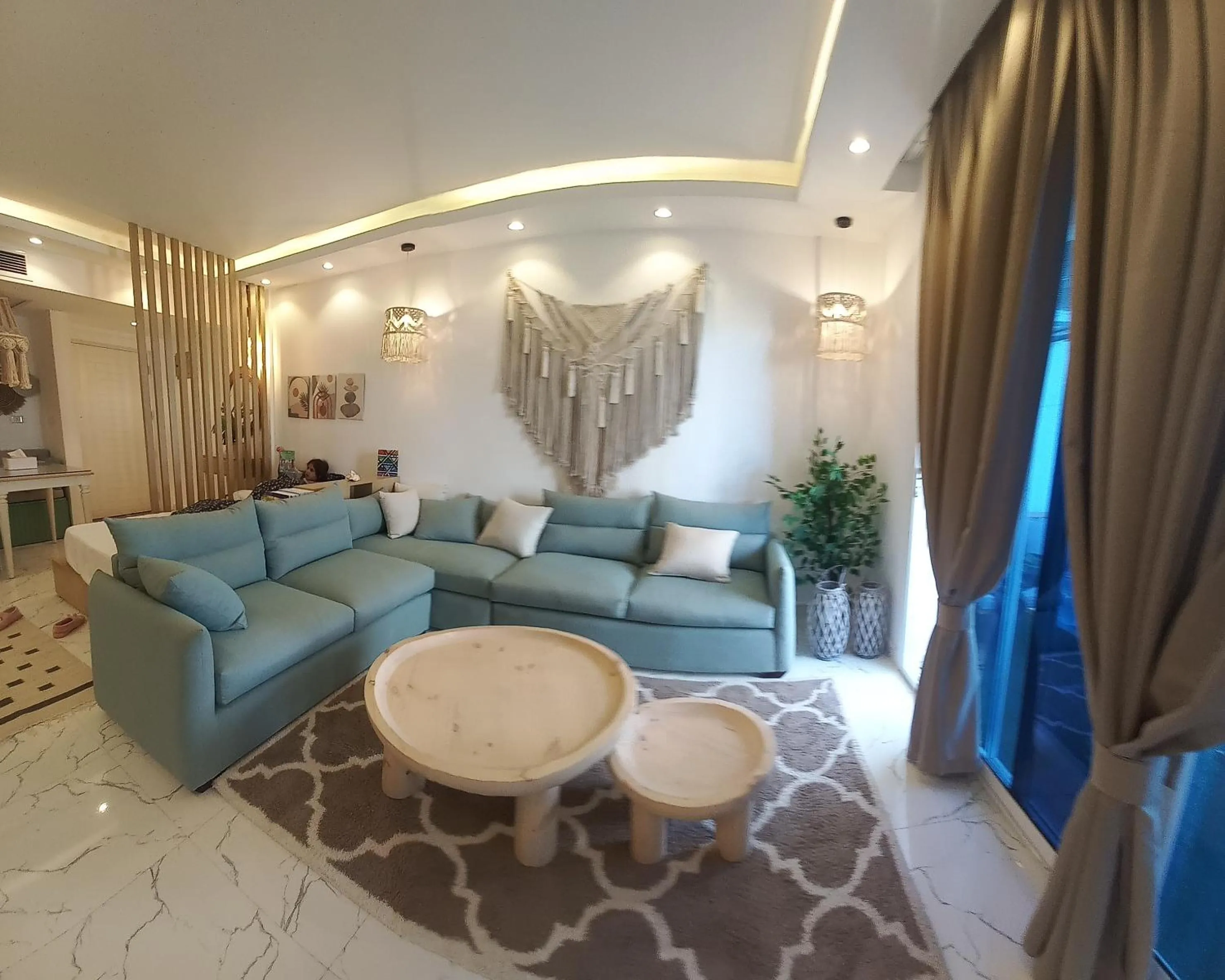 Seating area in Beachfront Boho Style apartment in Fanadir Bay