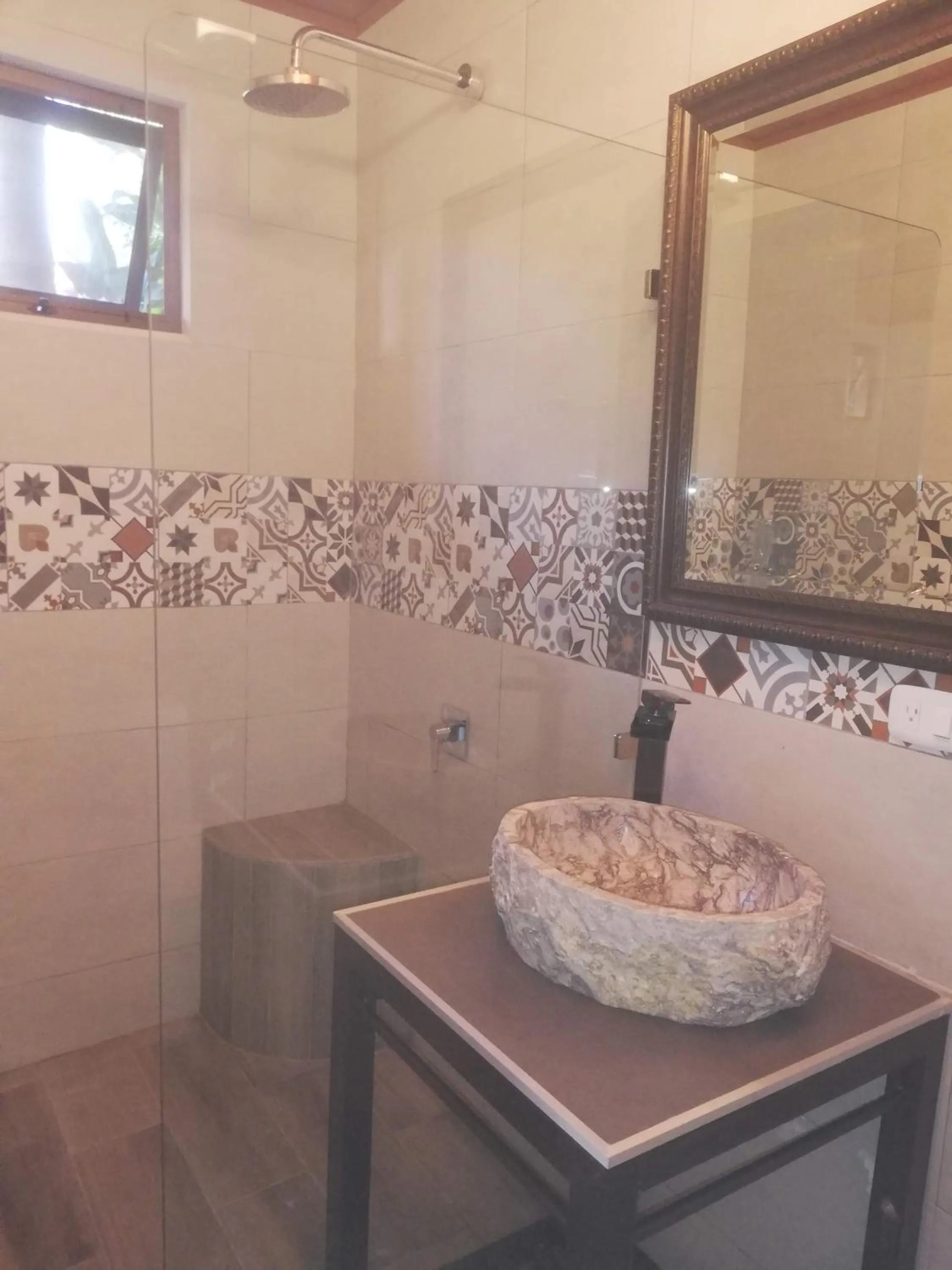 Shower in Coyaba Tropical Elegant Adult Guesthouse