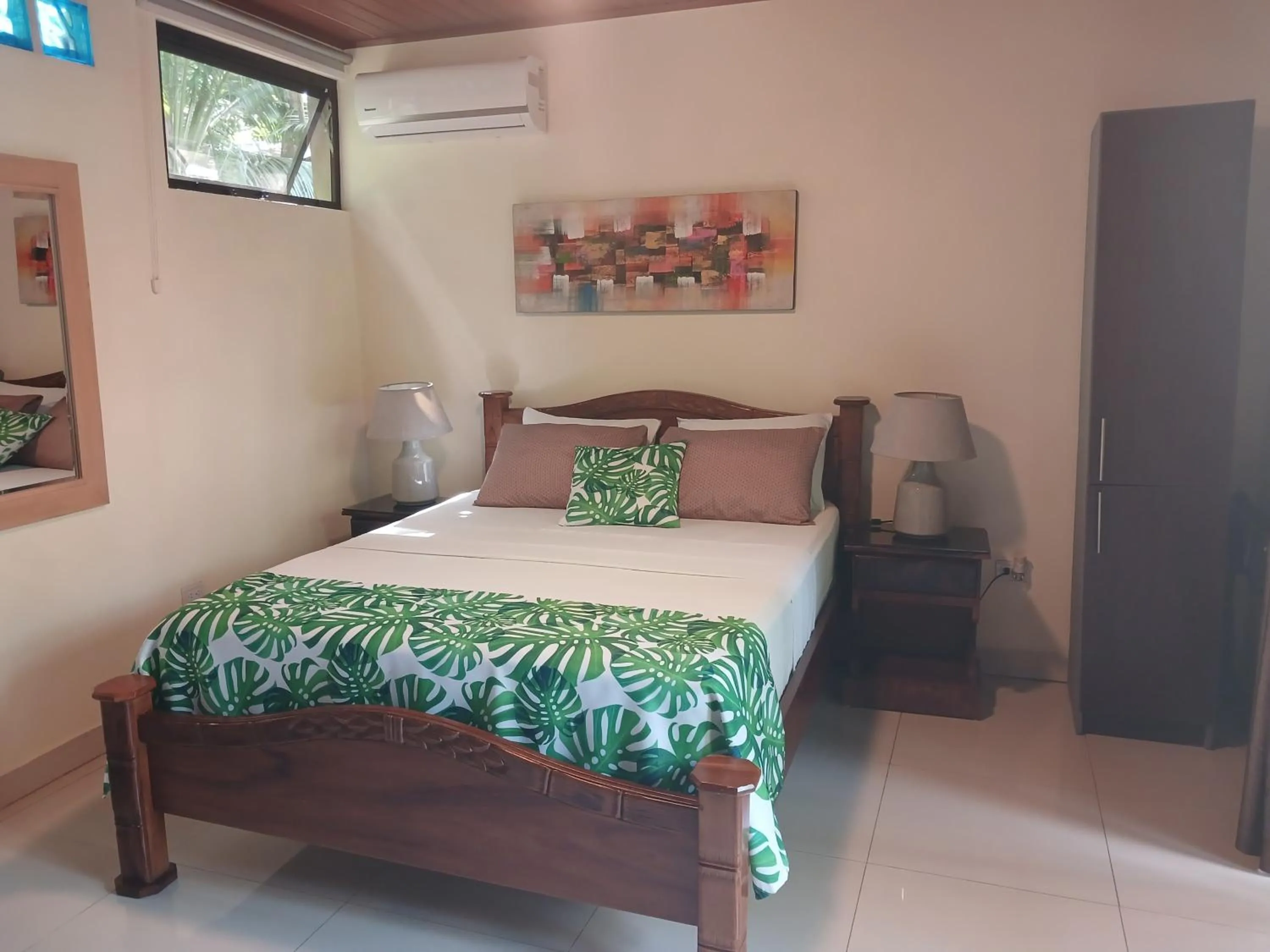 Bed in Coyaba Tropical Elegant Adult Guesthouse