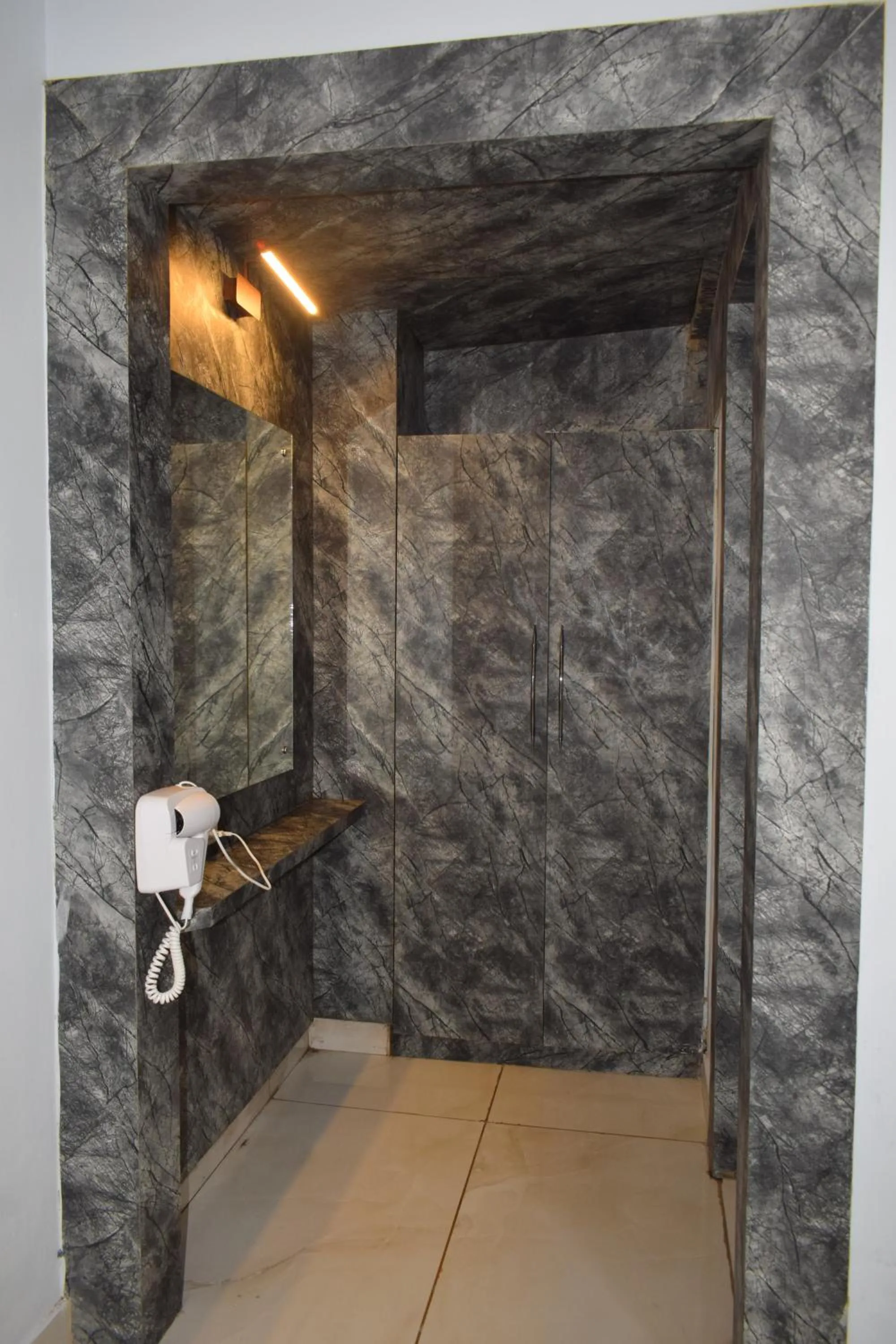 wardrobe in Country Ambience Hotel By Jags City Mall