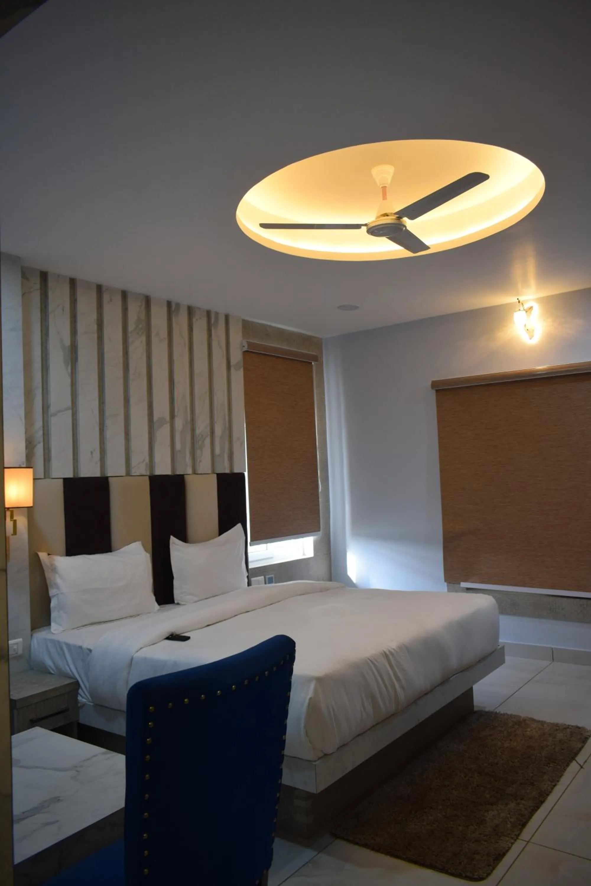 Bedroom, Bed in Country Ambience Hotel By Jags City Mall