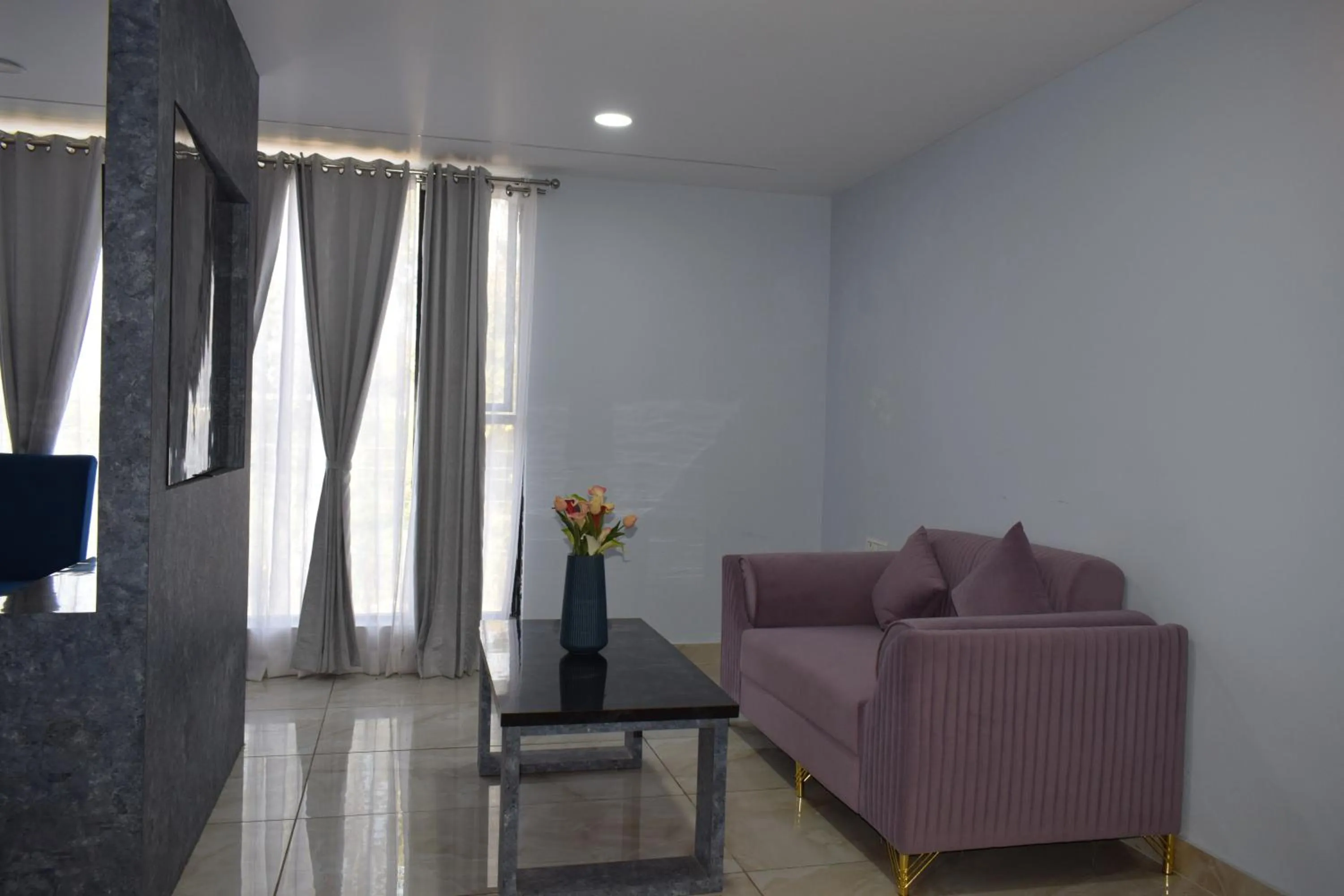 Seating area in Country Ambience Hotel By Jags City Mall