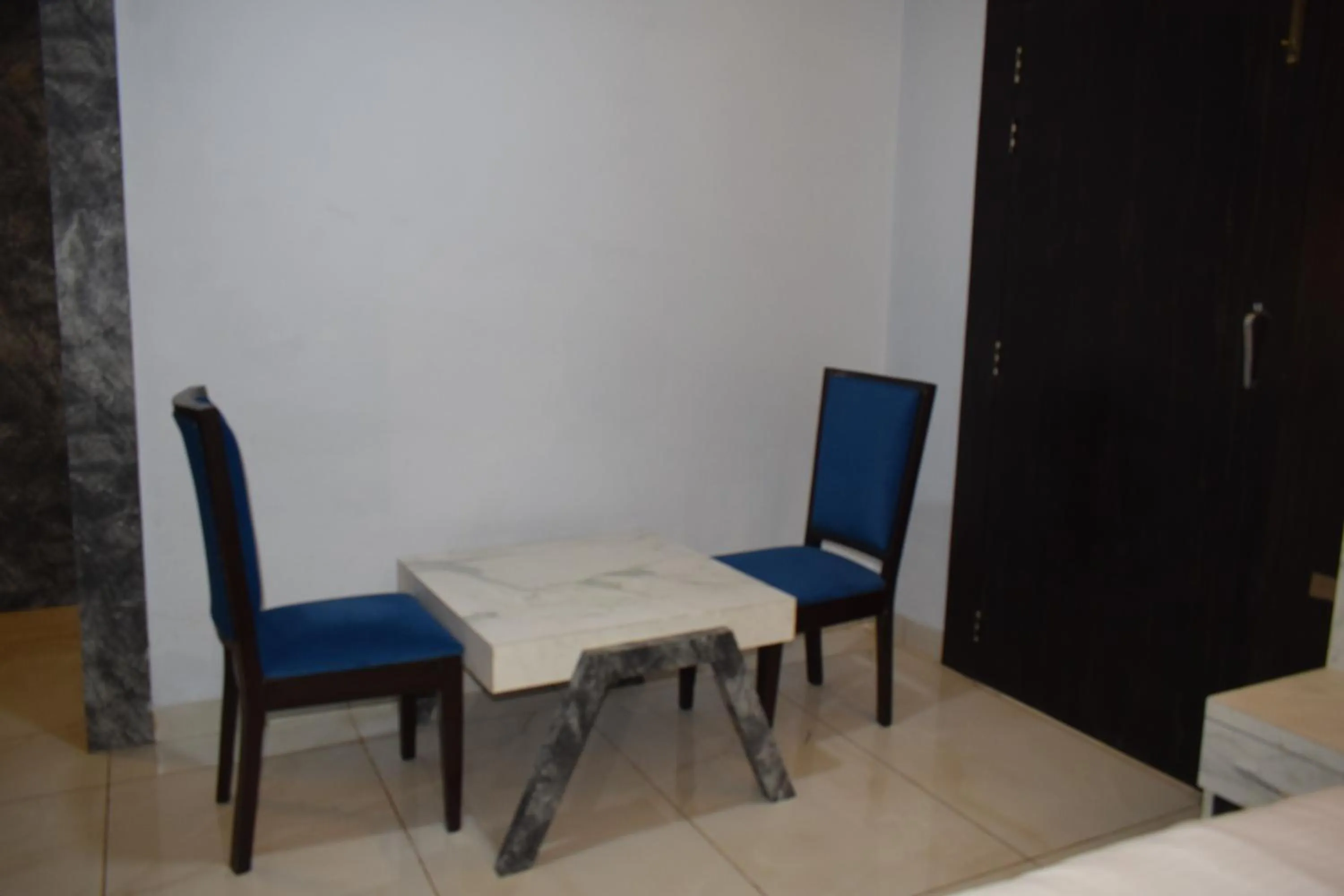 Seating area in Country Ambience Hotel By Jags City Mall