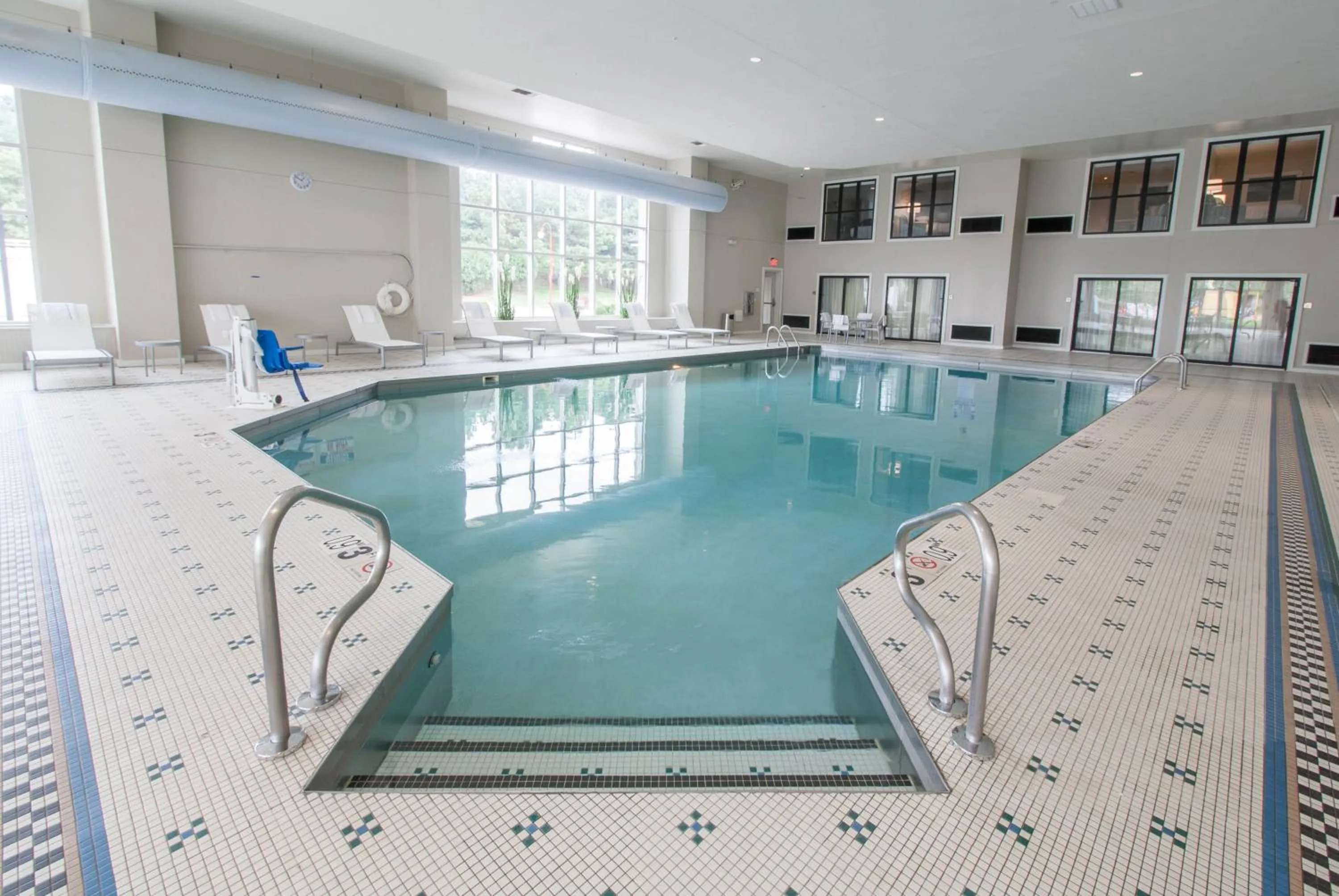 Swimming pool in Hotel Renovo Des Moines Urbandale,Tapestry Collection Hilton