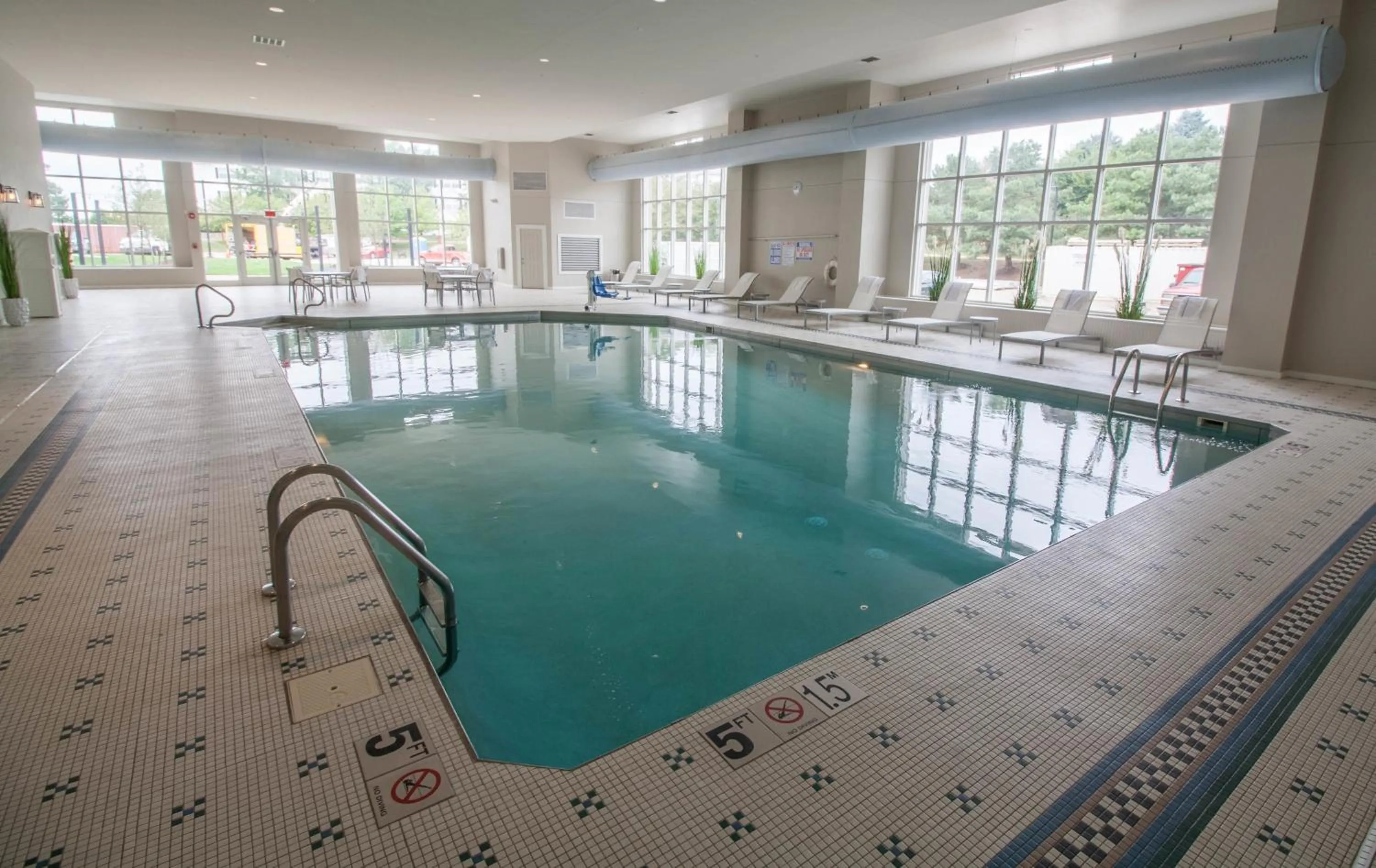 Swimming pool in Hotel Renovo Des Moines Urbandale,Tapestry Collection Hilton