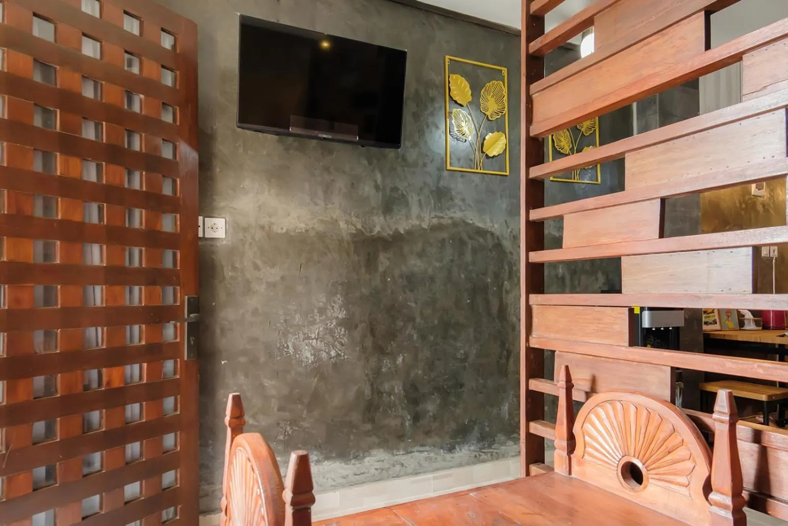 Communal lounge/ TV room in Jasmine Villa by TwoSpaces, Jimbaran