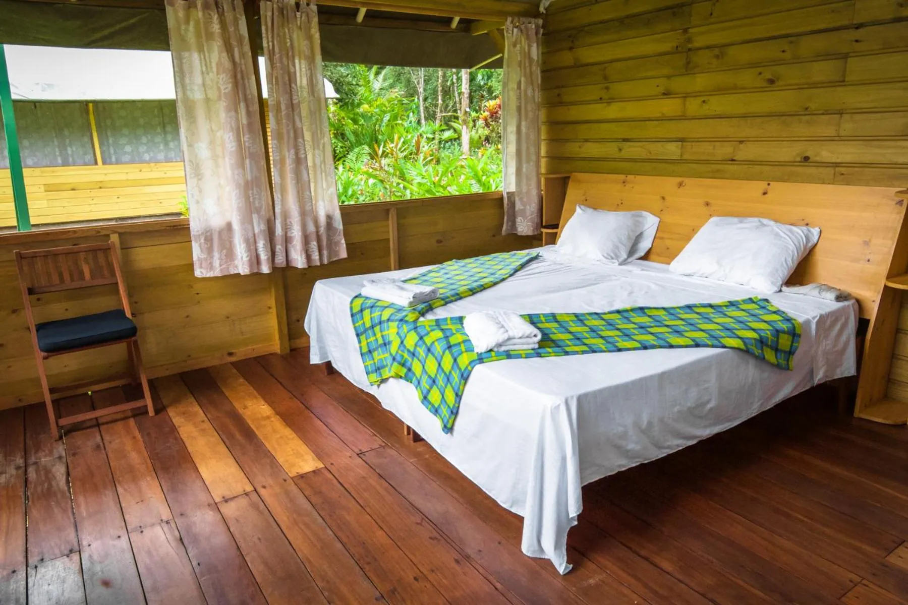 Bedroom in Lirio Lodge