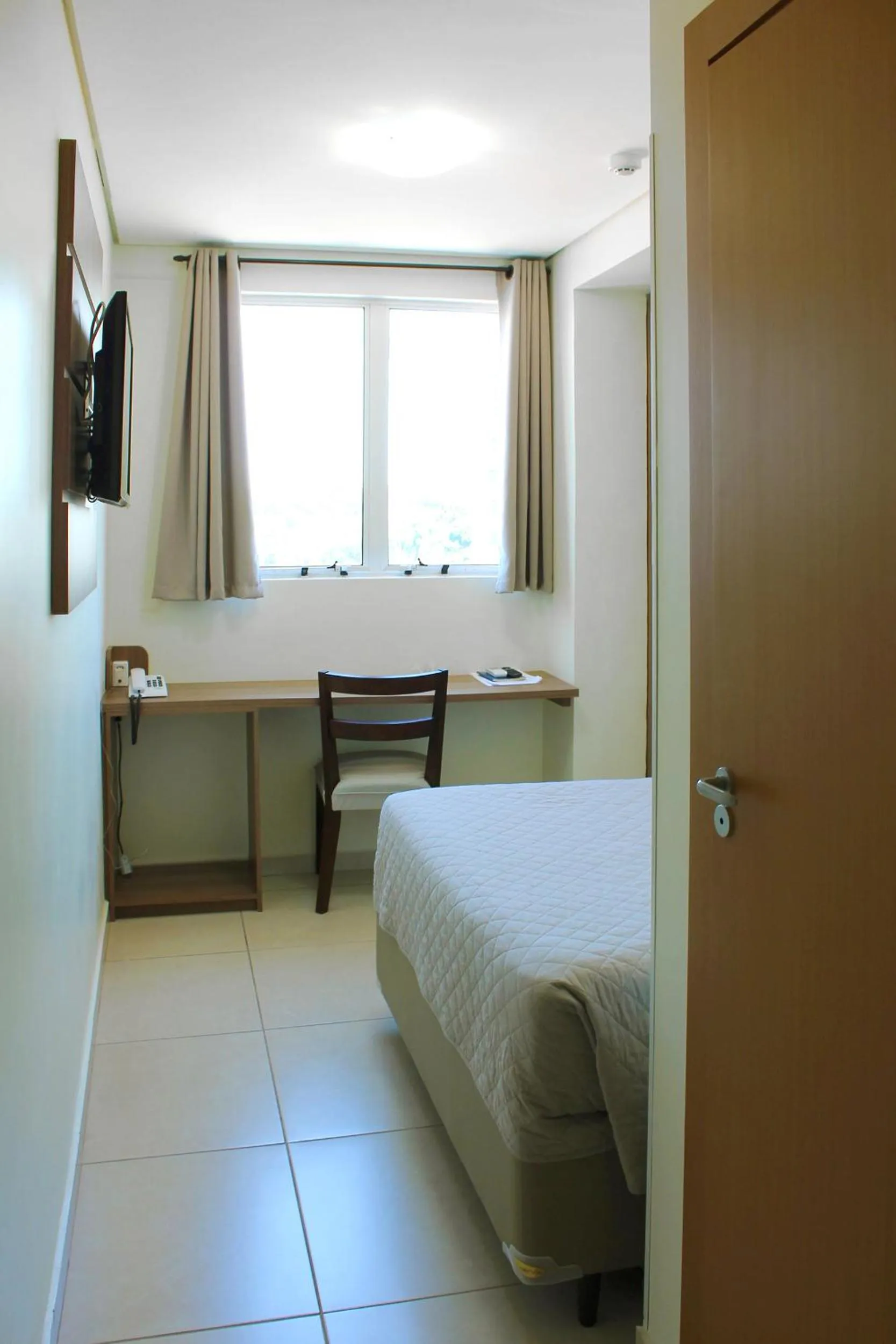 Bedroom, Bed in Tri Hotel Smart Chapecó