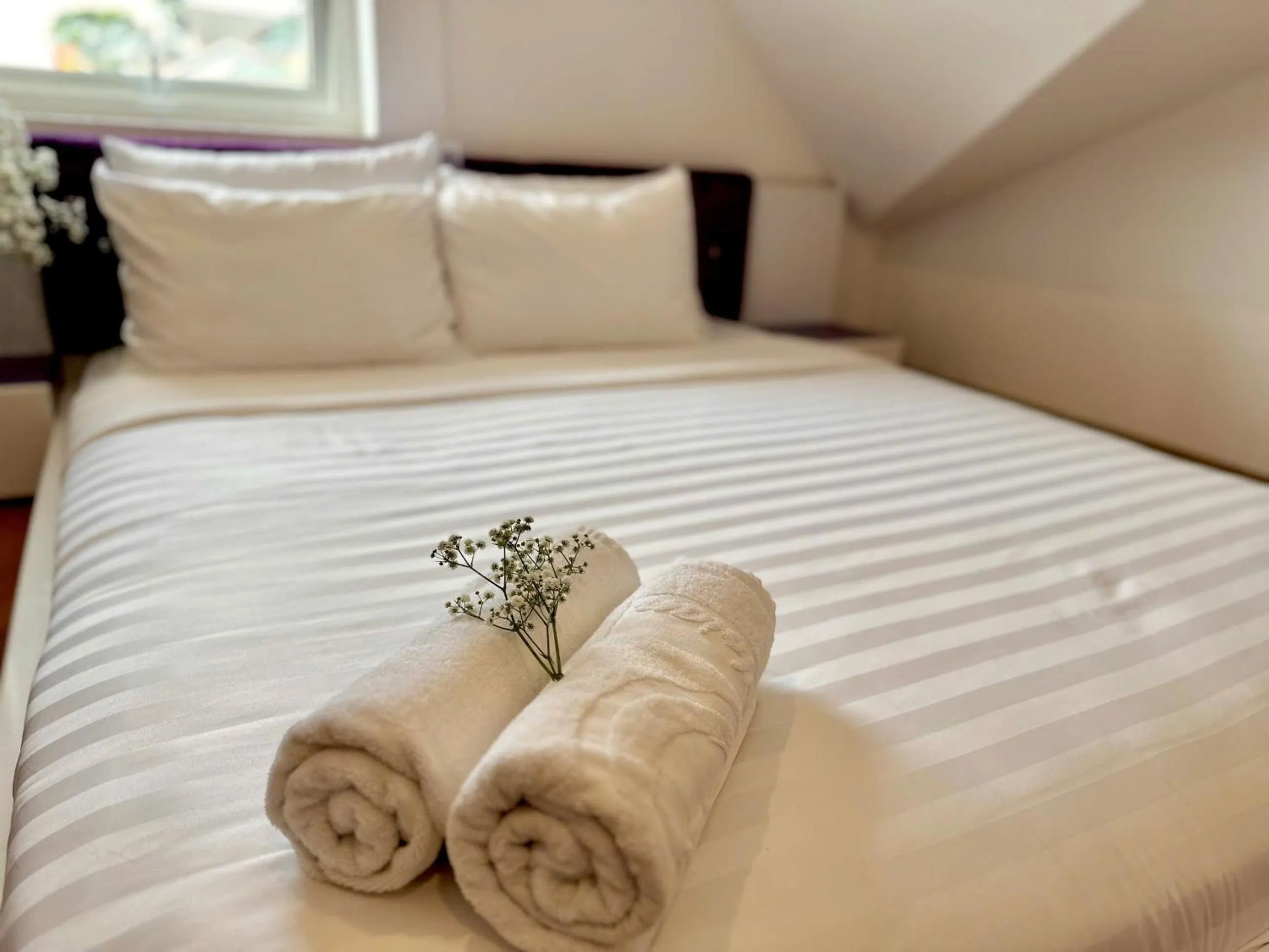 Bed in Moc Nha Minh Hotel Da Lat