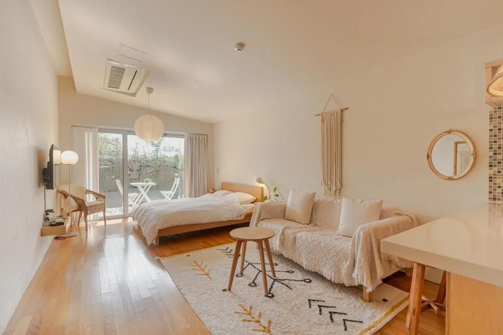 Bed in Jeju Mooi Pension