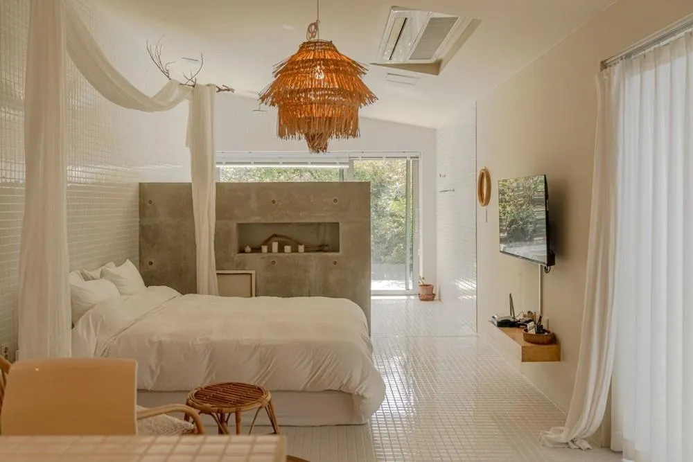 Bed in Jeju Mooi Pension