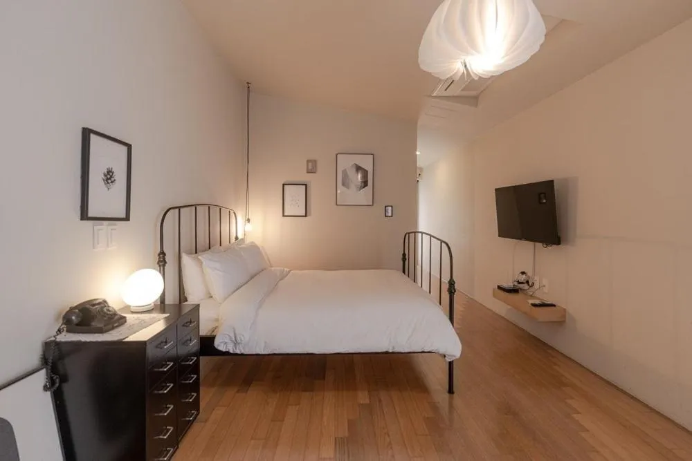 Bed in Jeju Mooi Pension