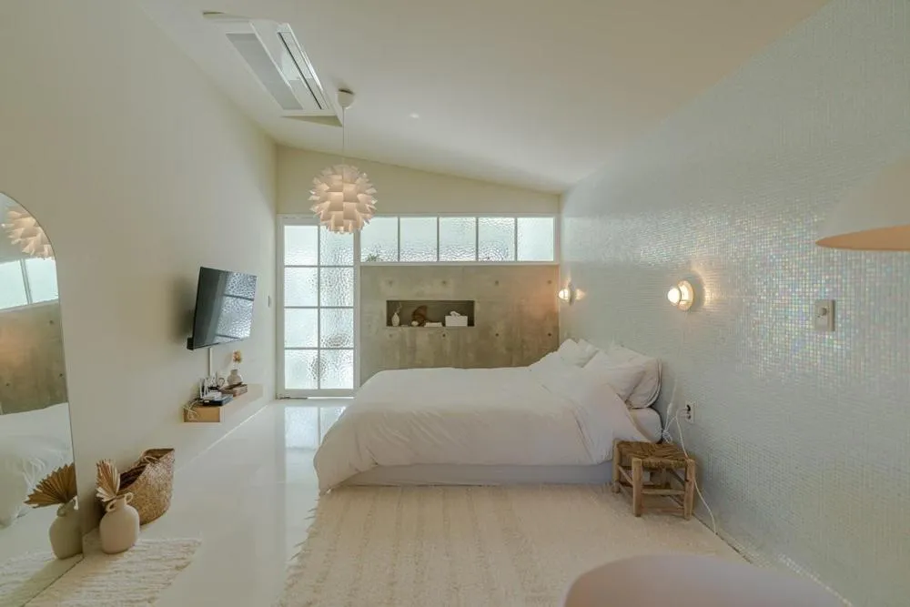 Bed in Jeju Mooi Pension