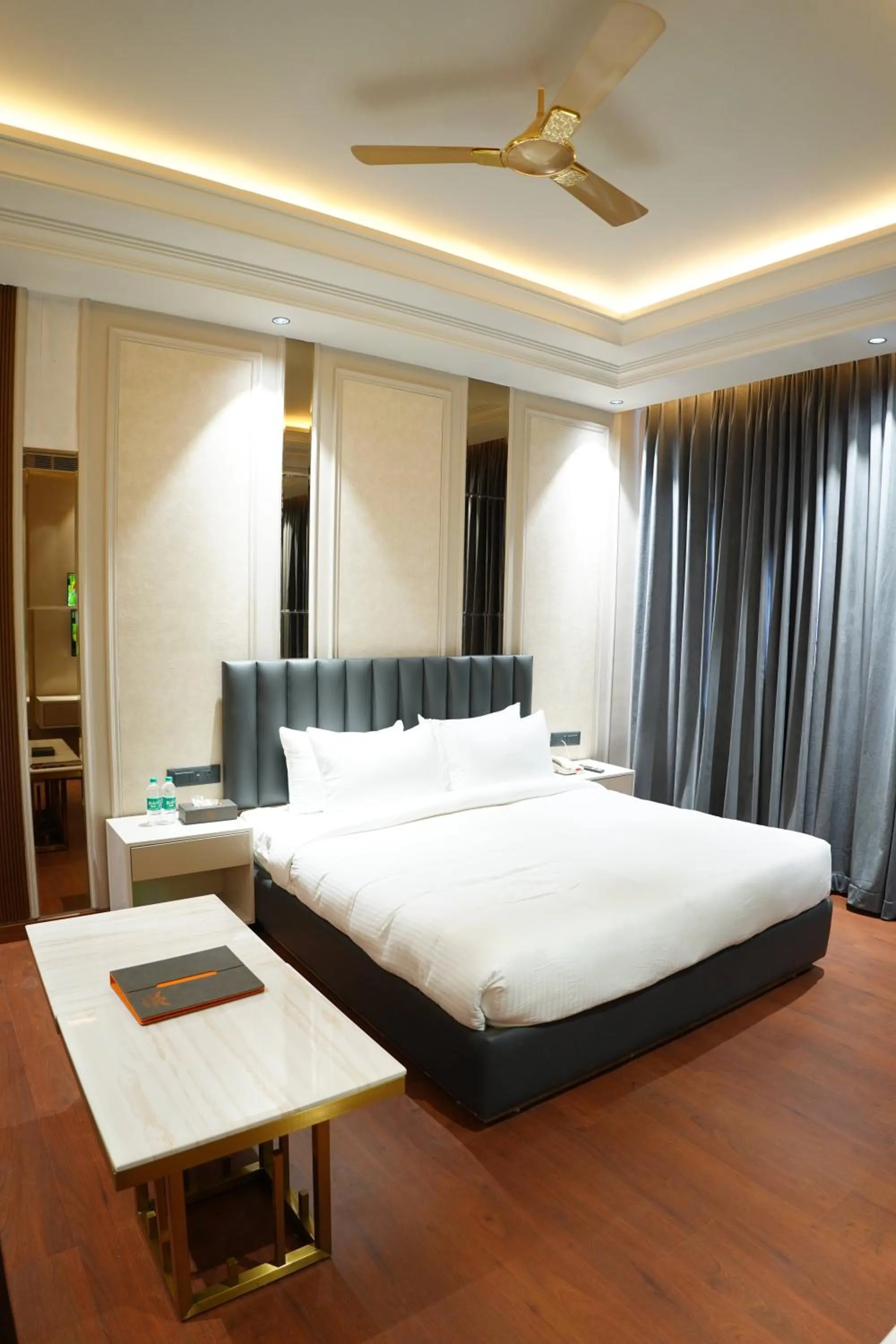 Bed in The Royal Velvet Hotel & Resort