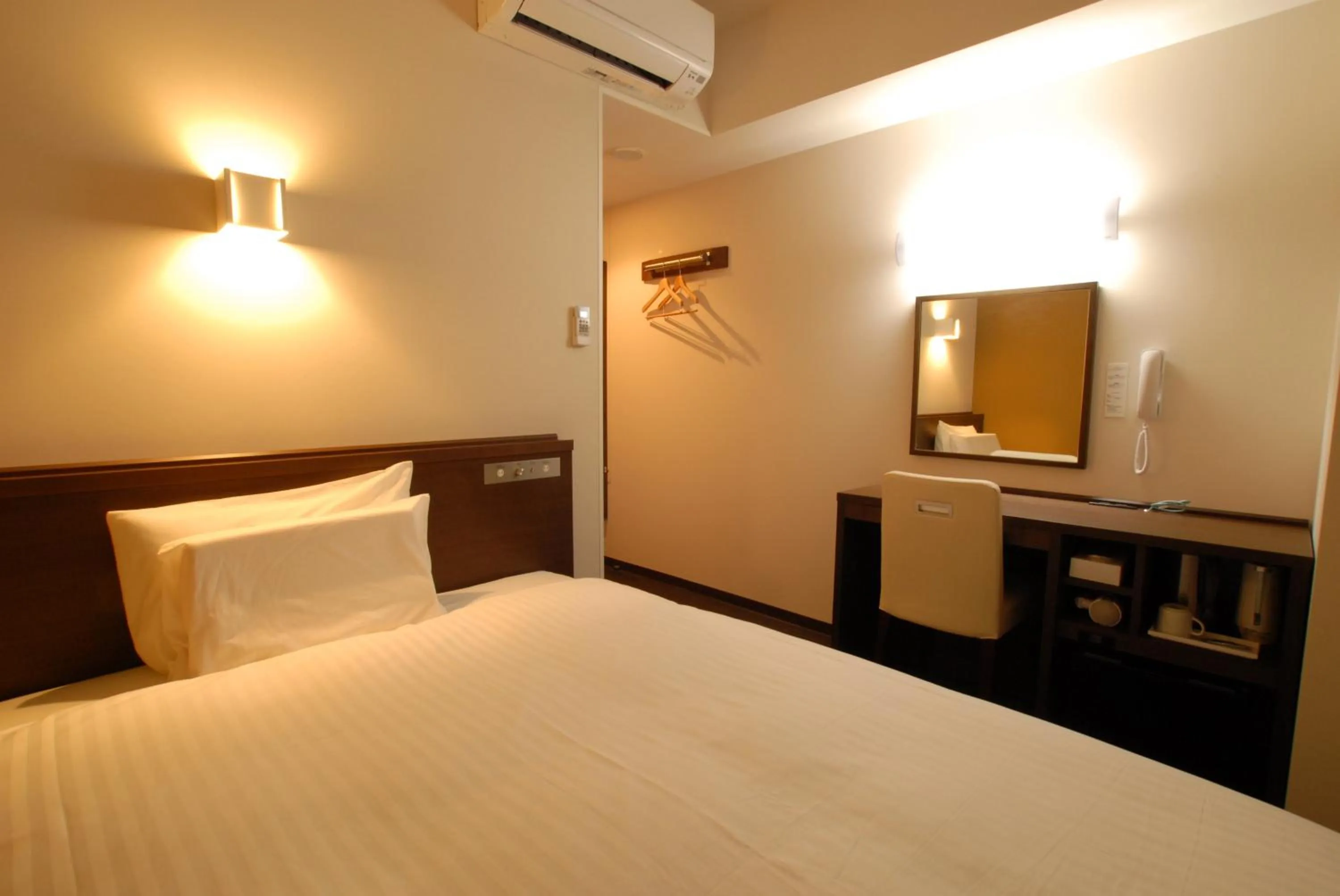 Bed in AB Hotel Kanazawa