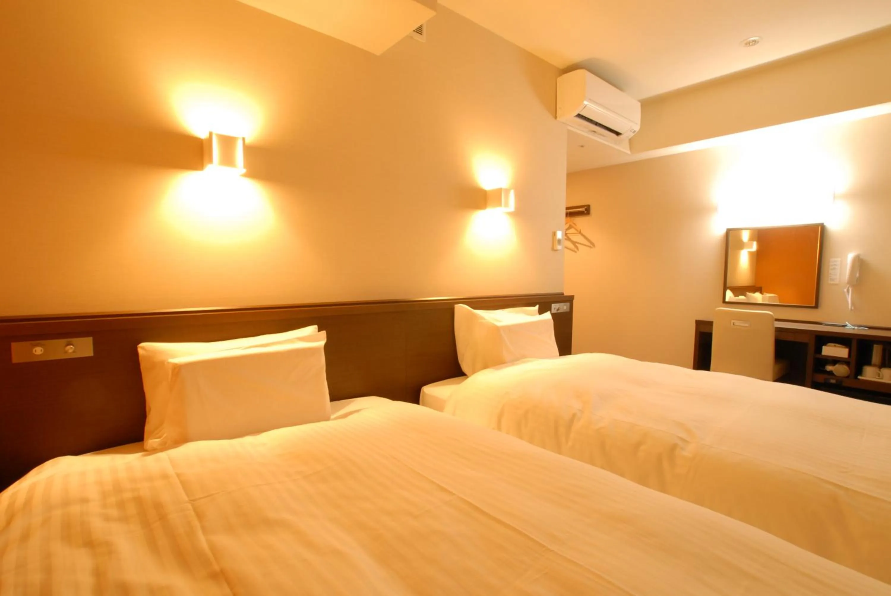 Bed in AB Hotel Kanazawa