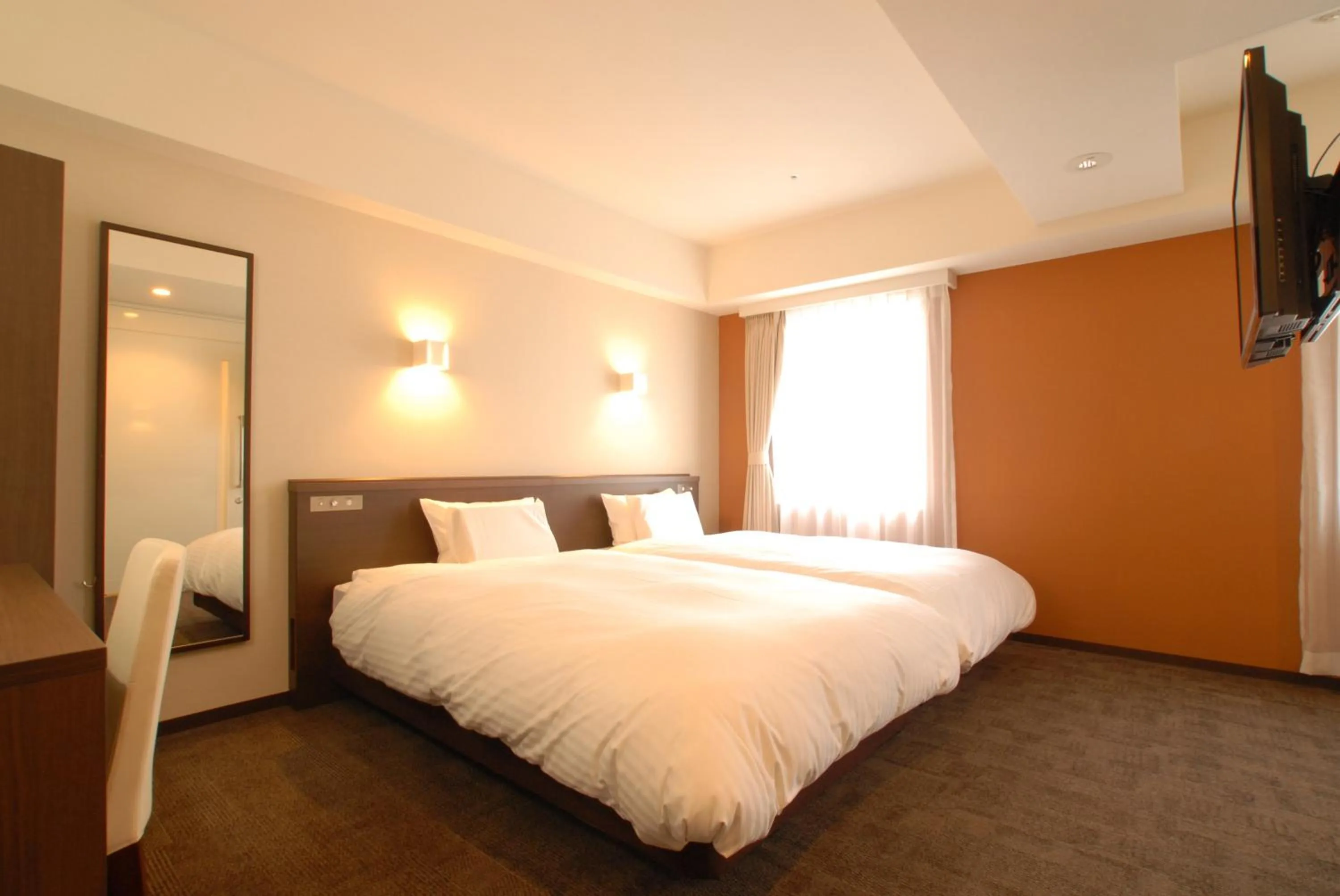 Bed in AB Hotel Kanazawa