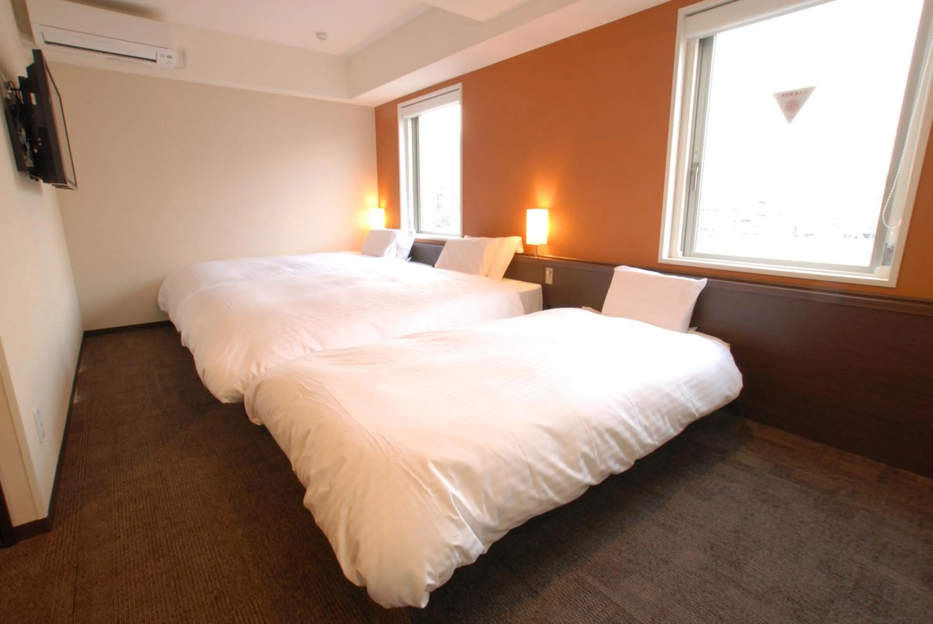 Bed in AB Hotel Kanazawa