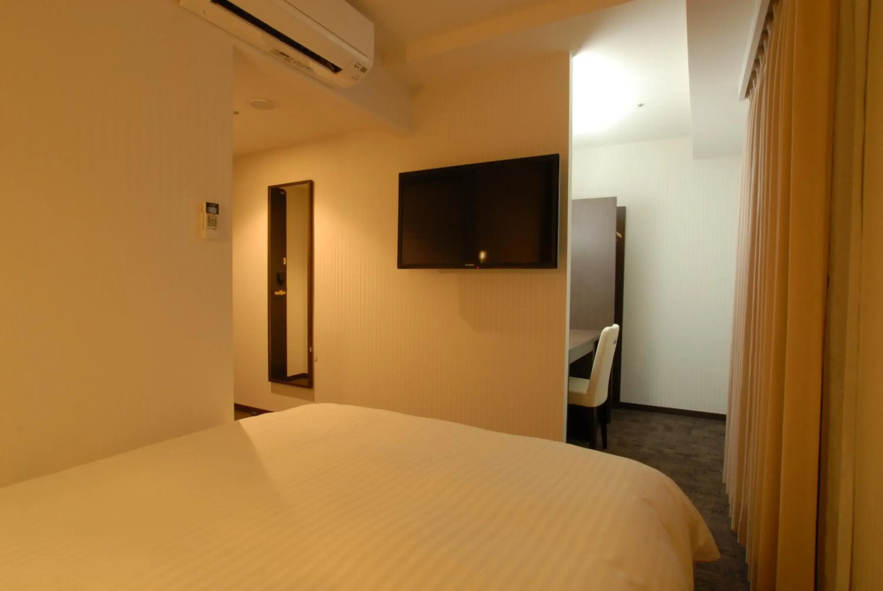 Bed in AB Hotel Kanazawa Bed in AB Hotel Kanazawa