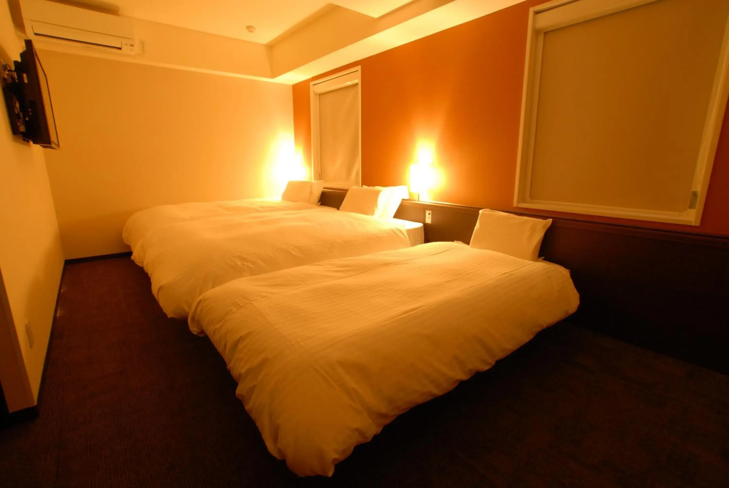 Bed in AB Hotel Kanazawa Bed in AB Hotel Kanazawa