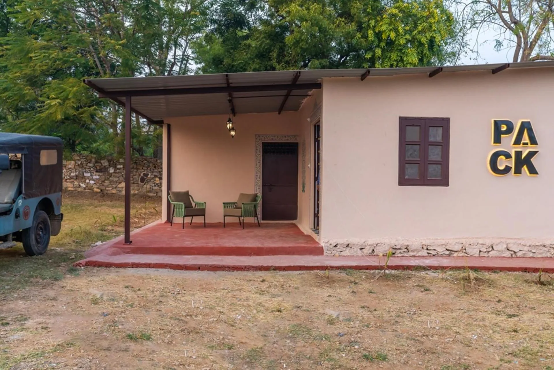 Property logo or sign in Indulge Udaipur by Pack