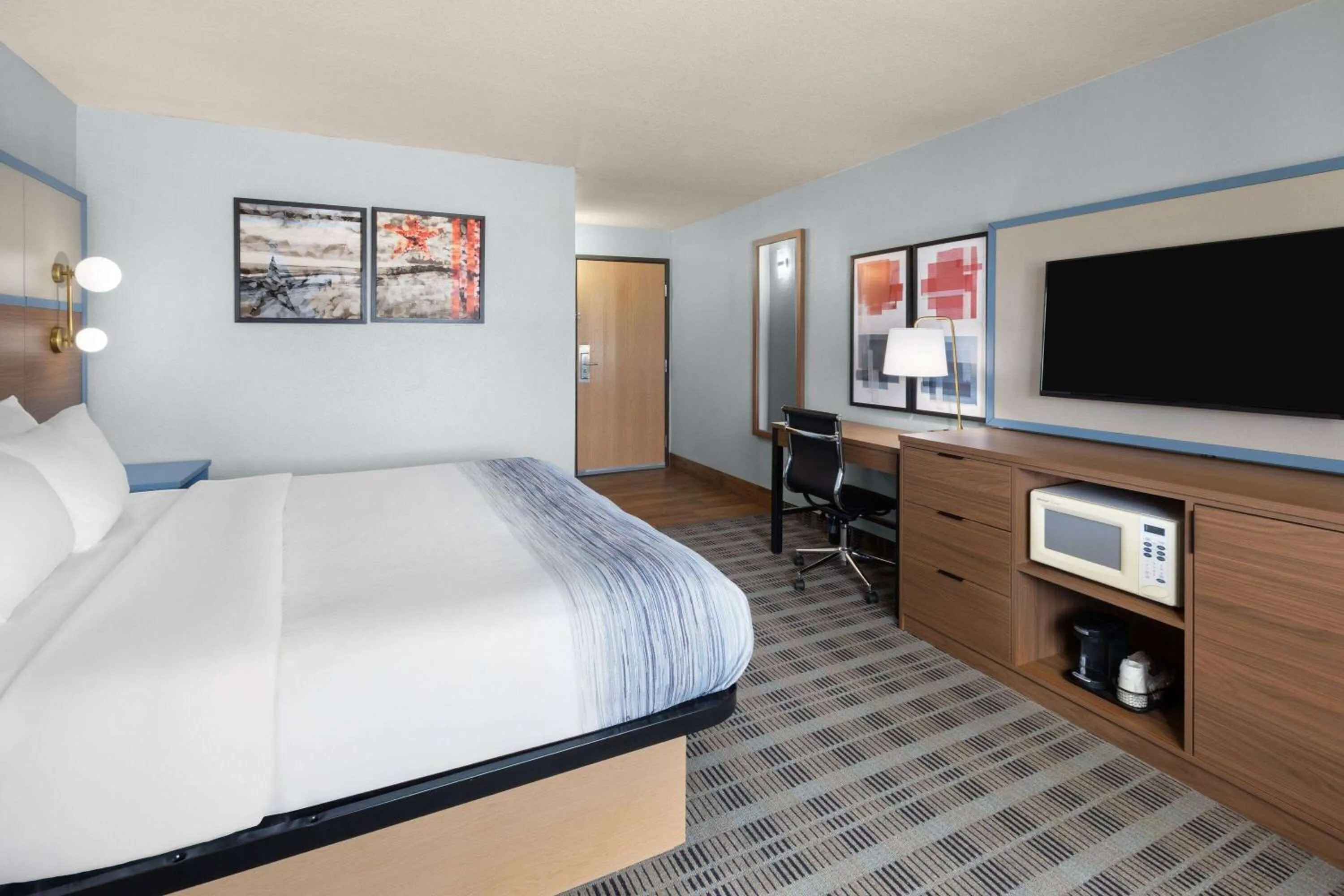 Photo of the whole room, Bed in AmericInn by Wyndham Oscoda Near AuSable River