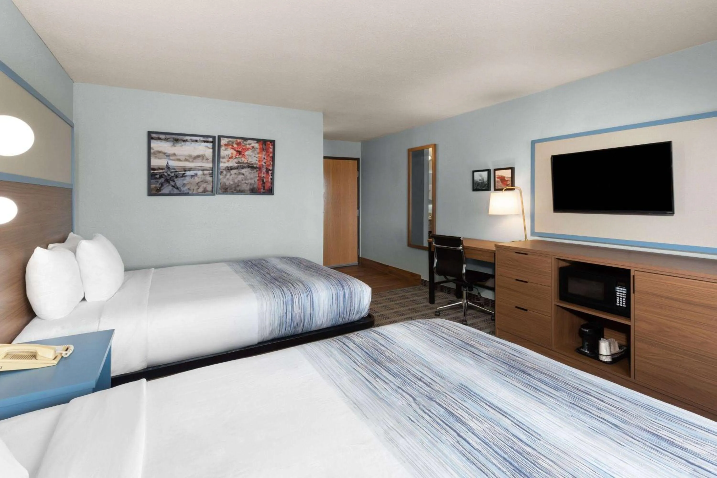 Photo of the whole room, Bed in AmericInn by Wyndham Oscoda Near AuSable River