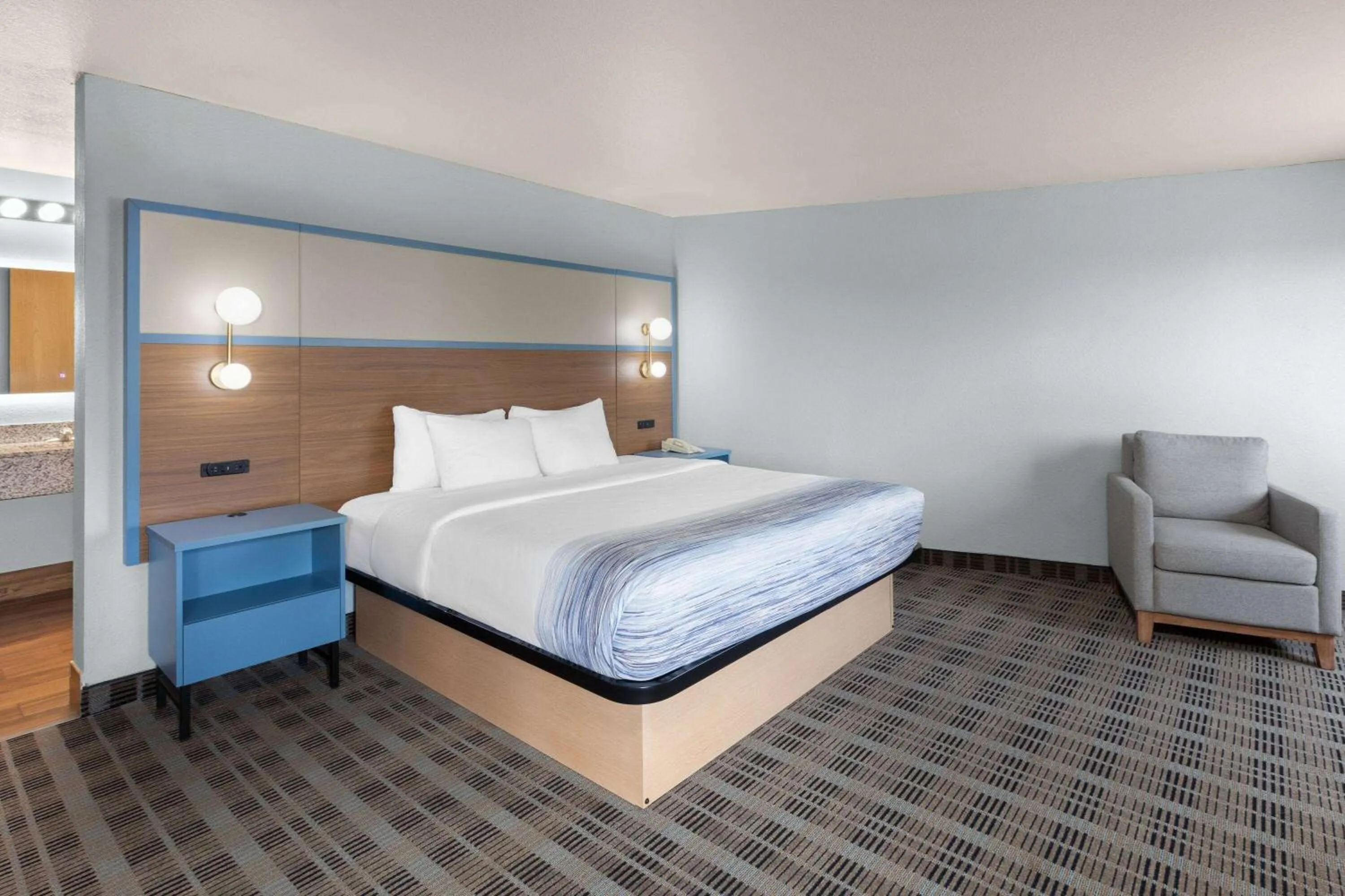 Photo of the whole room, Bed in AmericInn by Wyndham Oscoda Near AuSable River