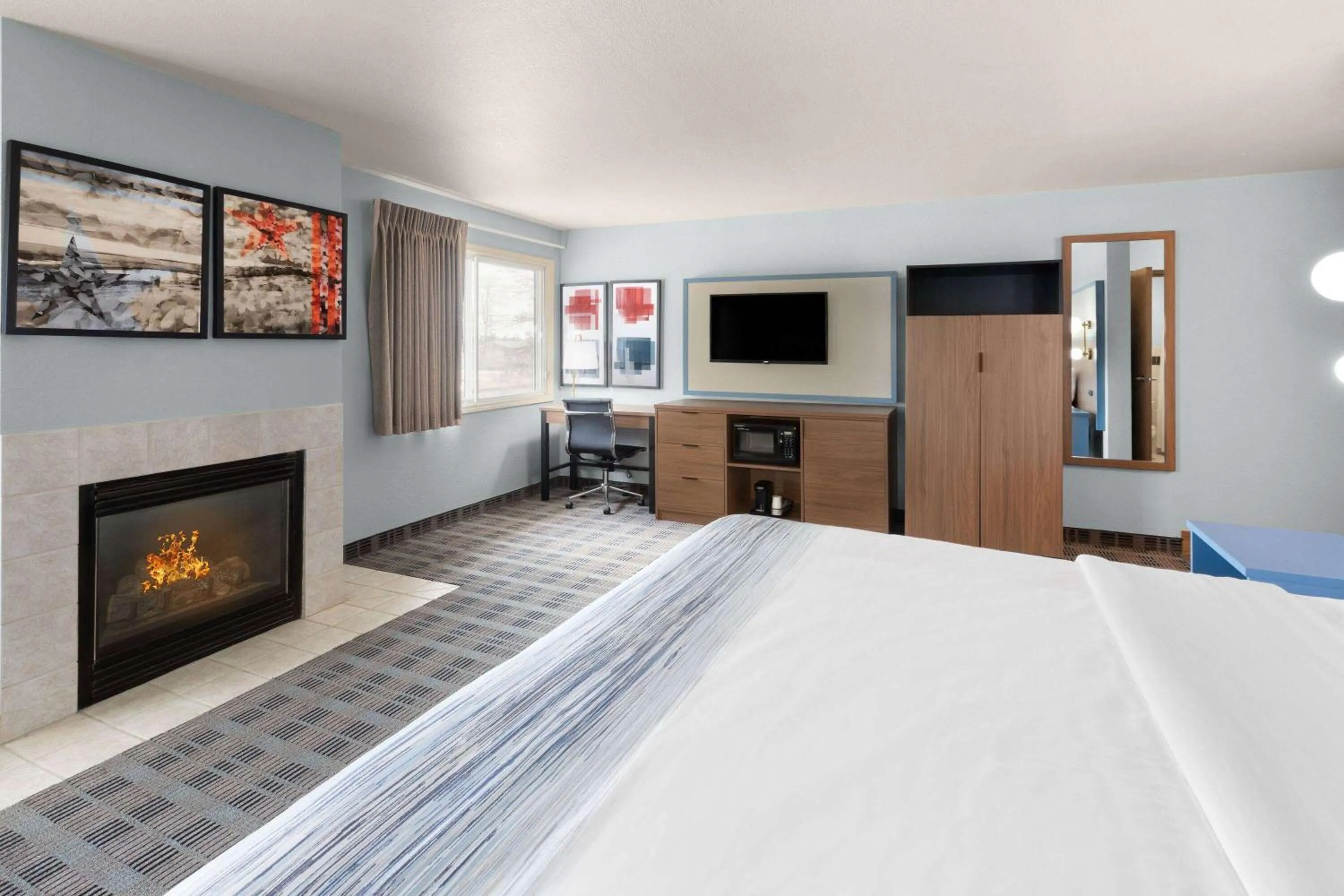 Photo of the whole room, Bed in AmericInn by Wyndham Oscoda Near AuSable River