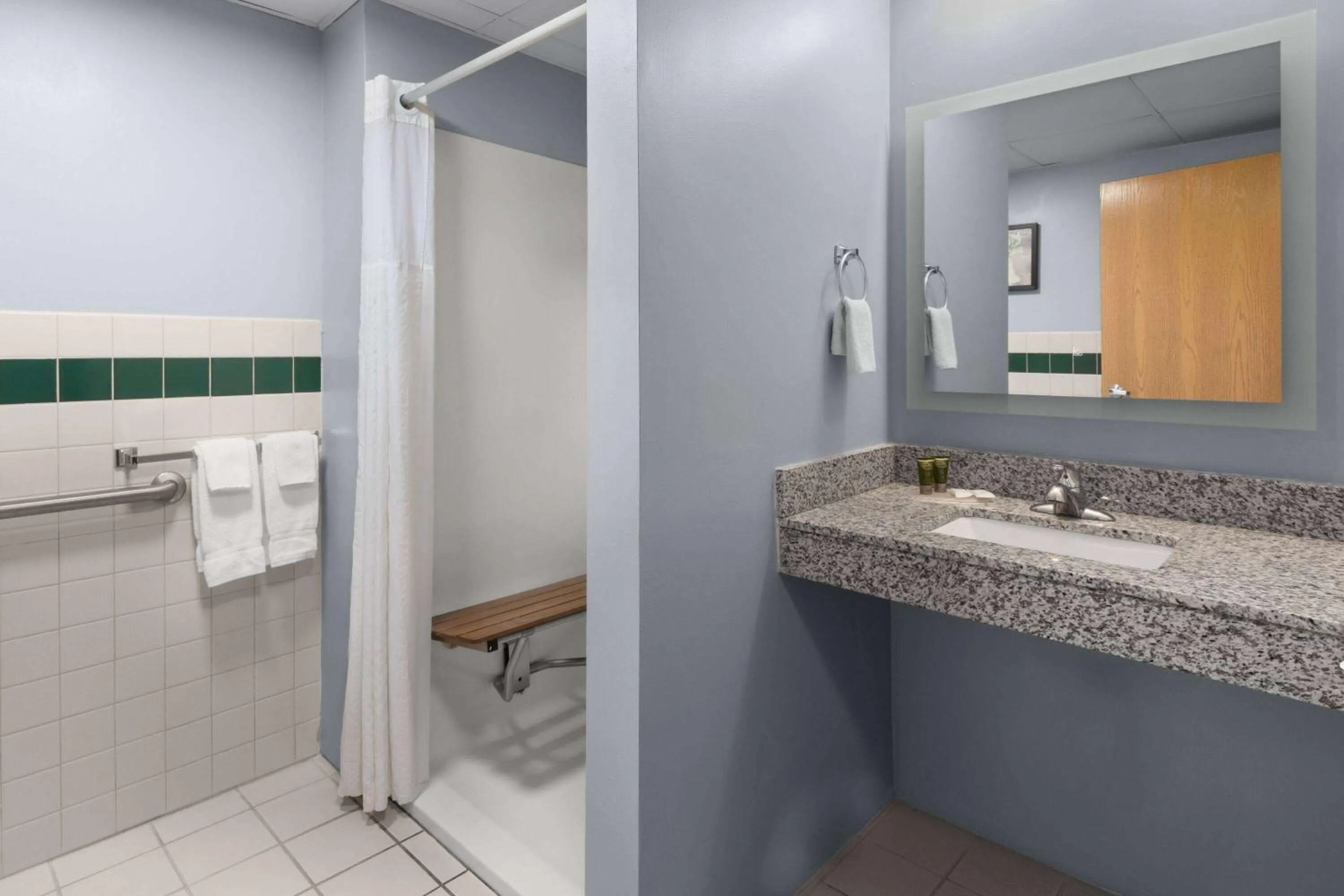 Bathroom in AmericInn by Wyndham Oscoda Near AuSable River