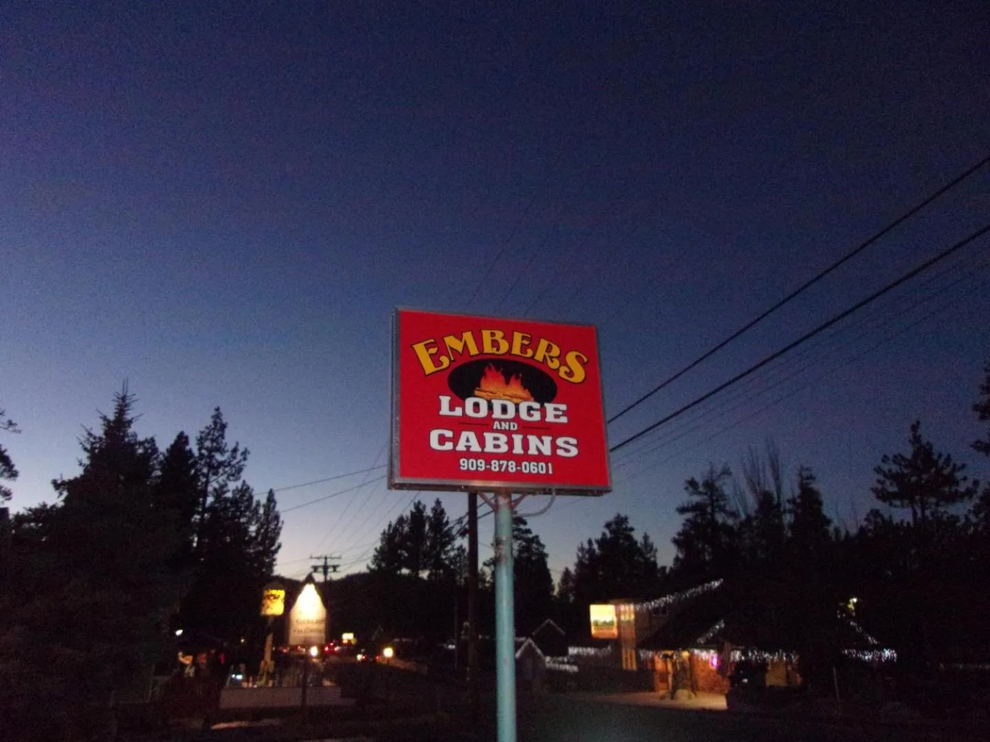 Property logo or sign in Embers Lodge & Cabins