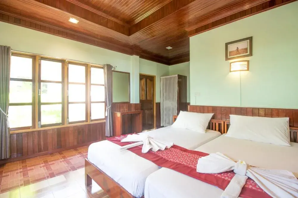 Bed in Yataa Spa and Resort Bed in Yataa Spa and Resort