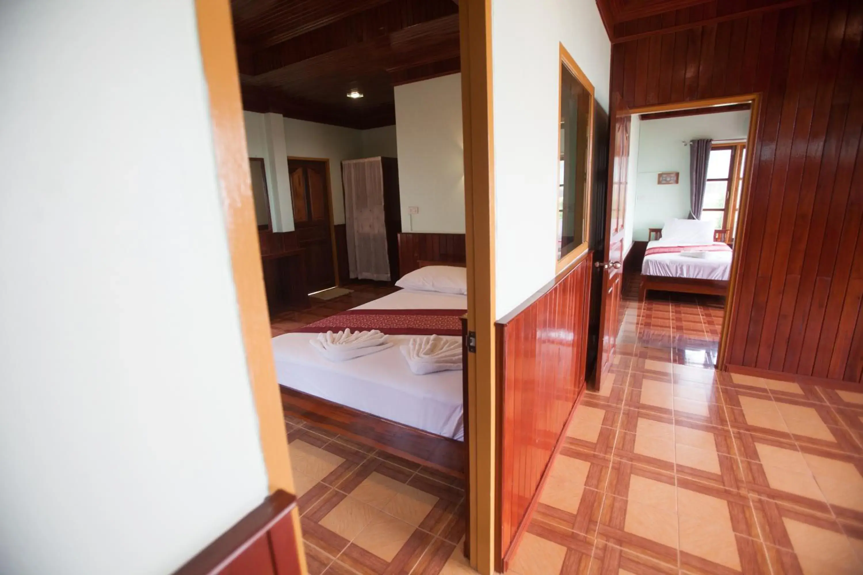 Bed in Yataa Spa and Resort Bed in Yataa Spa and Resort