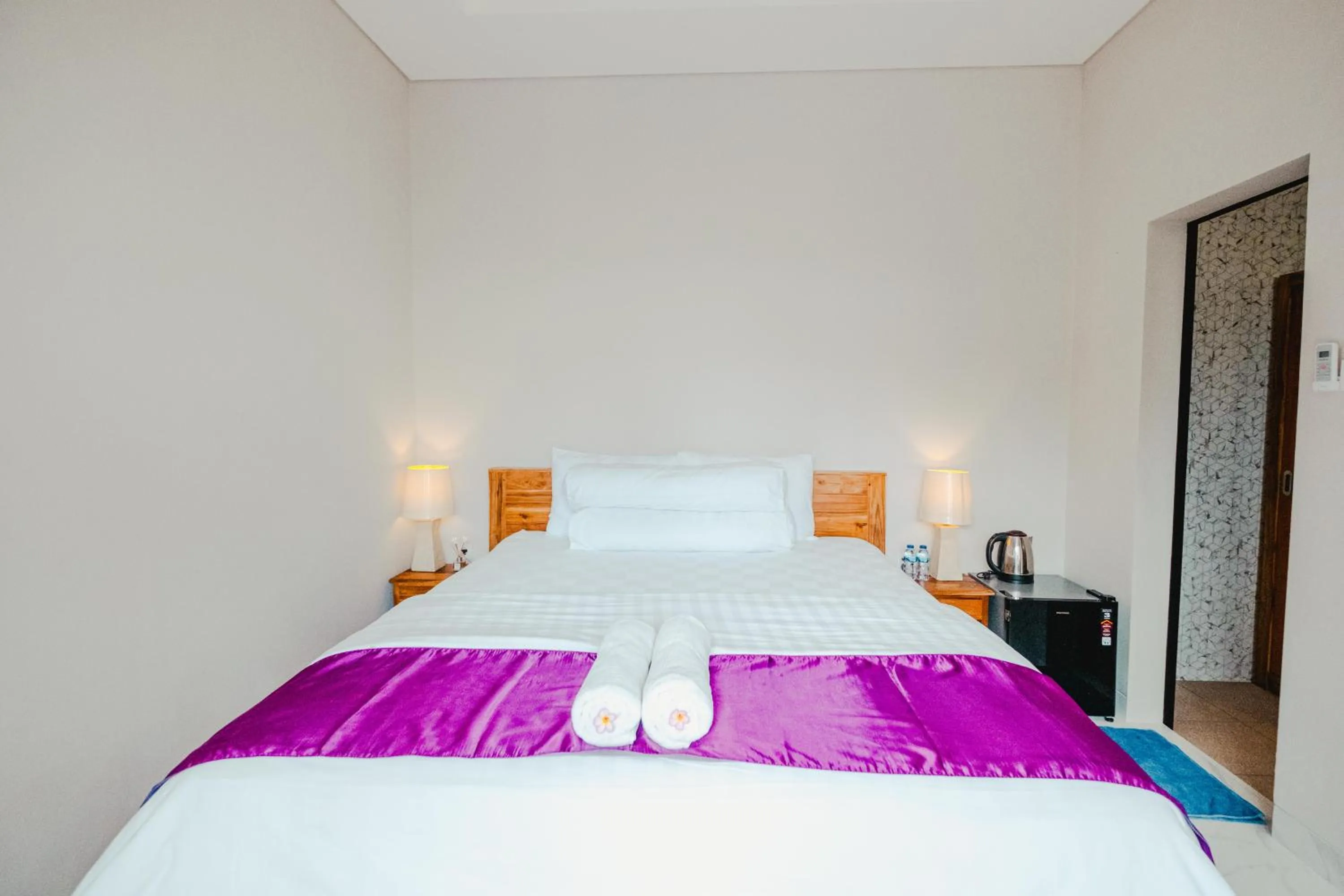 Bed in Turtle Shelter Guest House