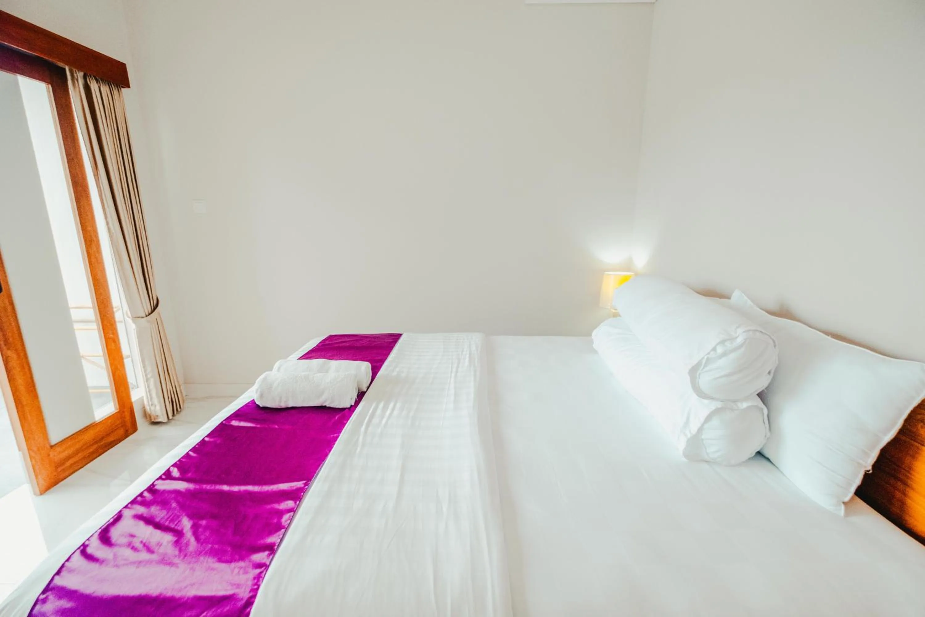 Bed in Turtle Shelter Guest House