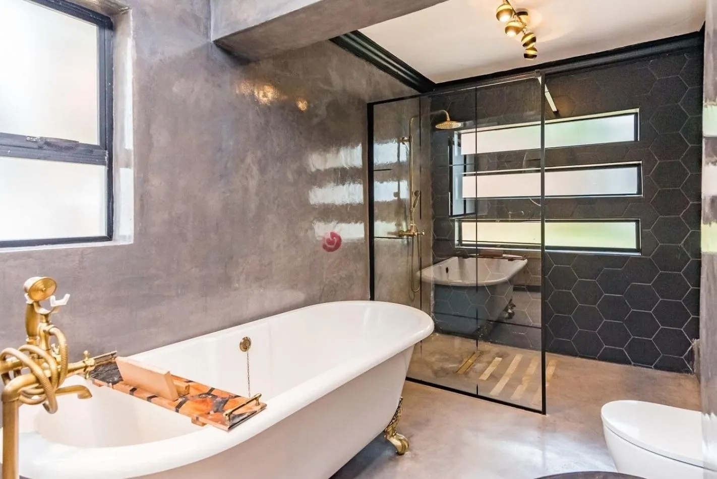 Shower in The Urban Sanctuary Boutique Hotel & Retreat