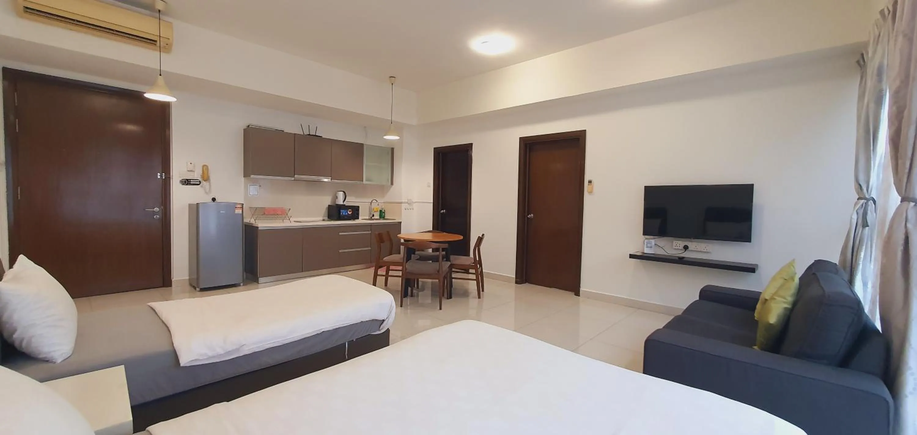 Living room, Bed in BEST KL City View at Regalia Residence