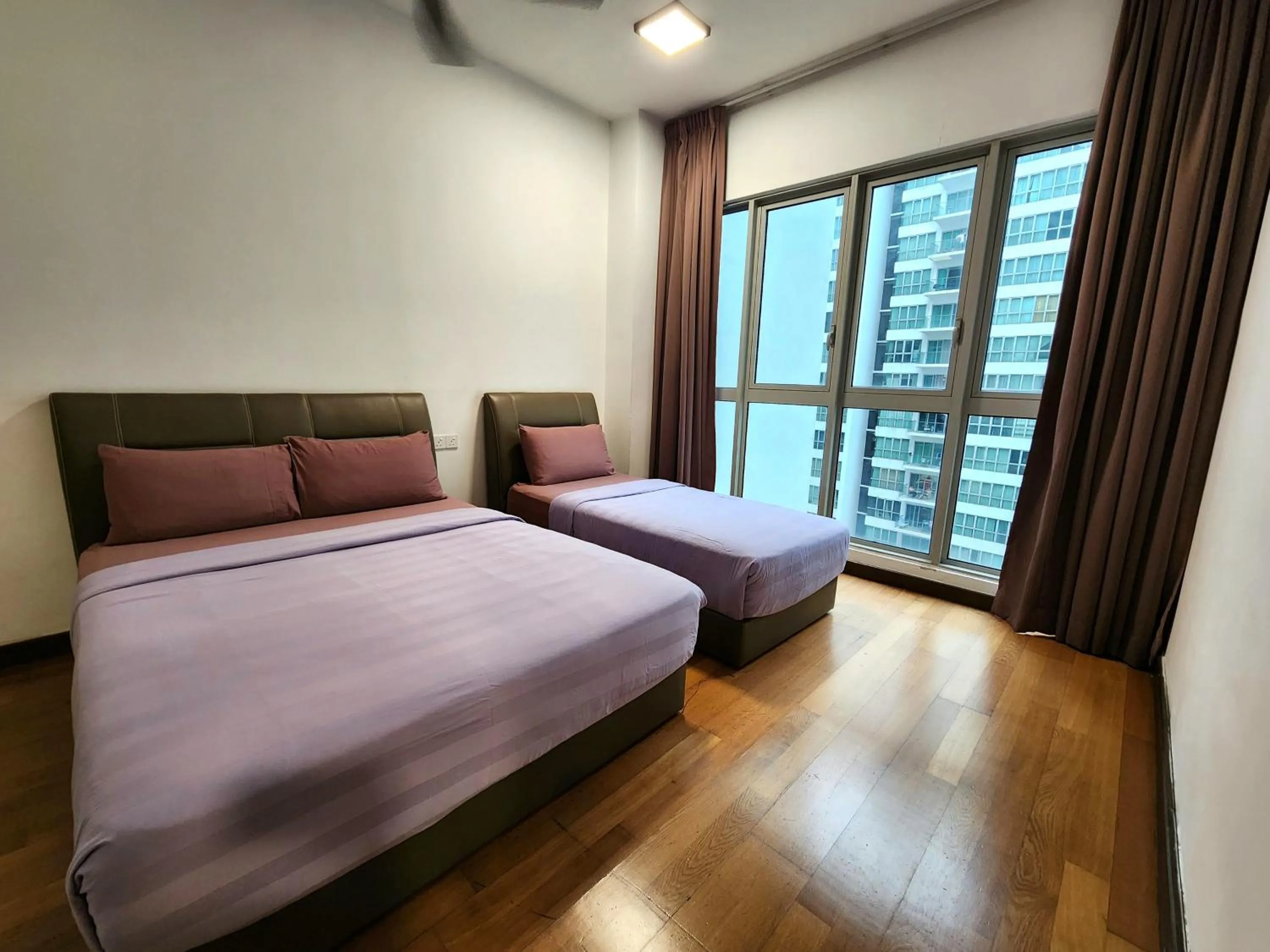 Bed in BEST KL City View at Regalia Residence