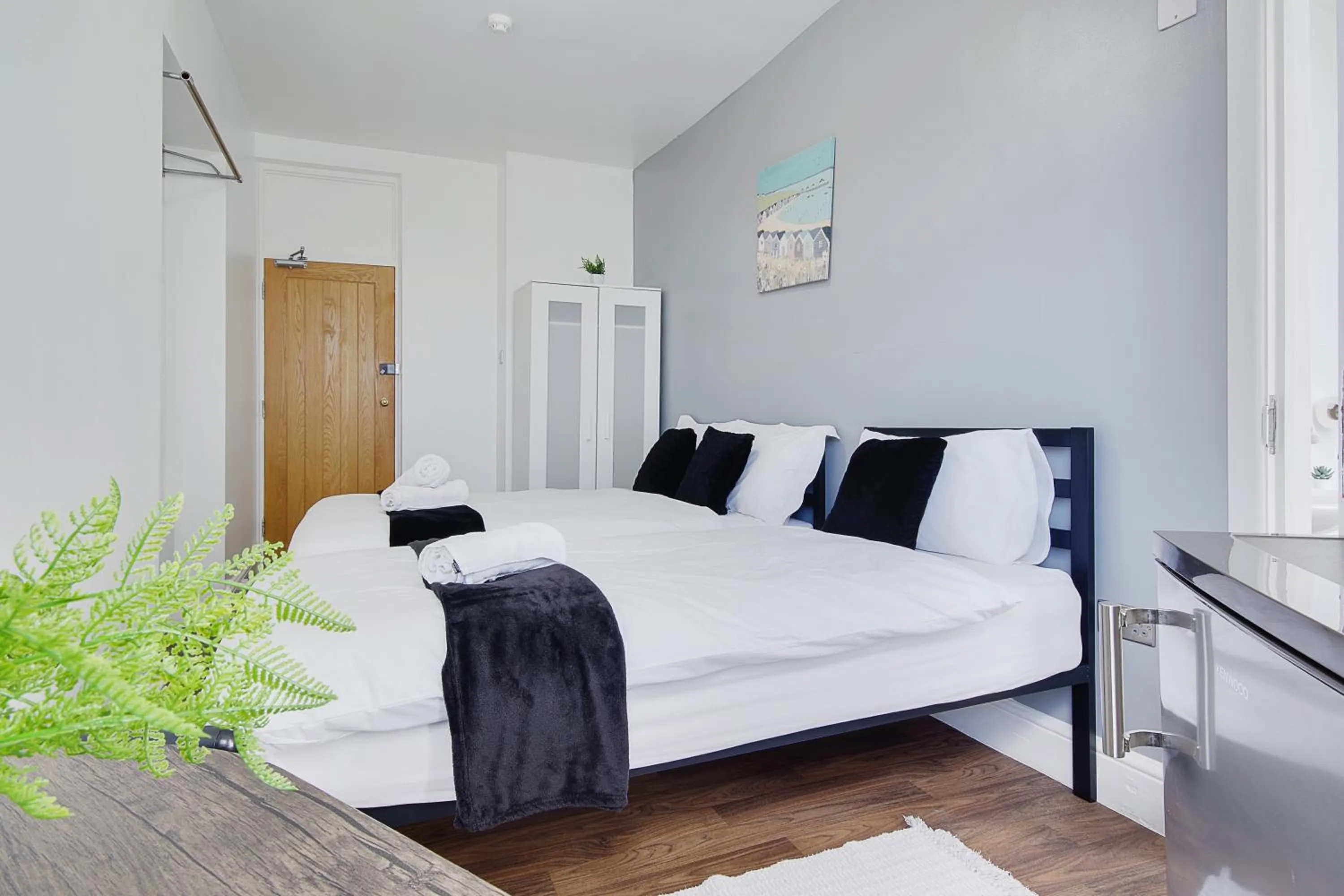 Bed in Azure Beach Hotel