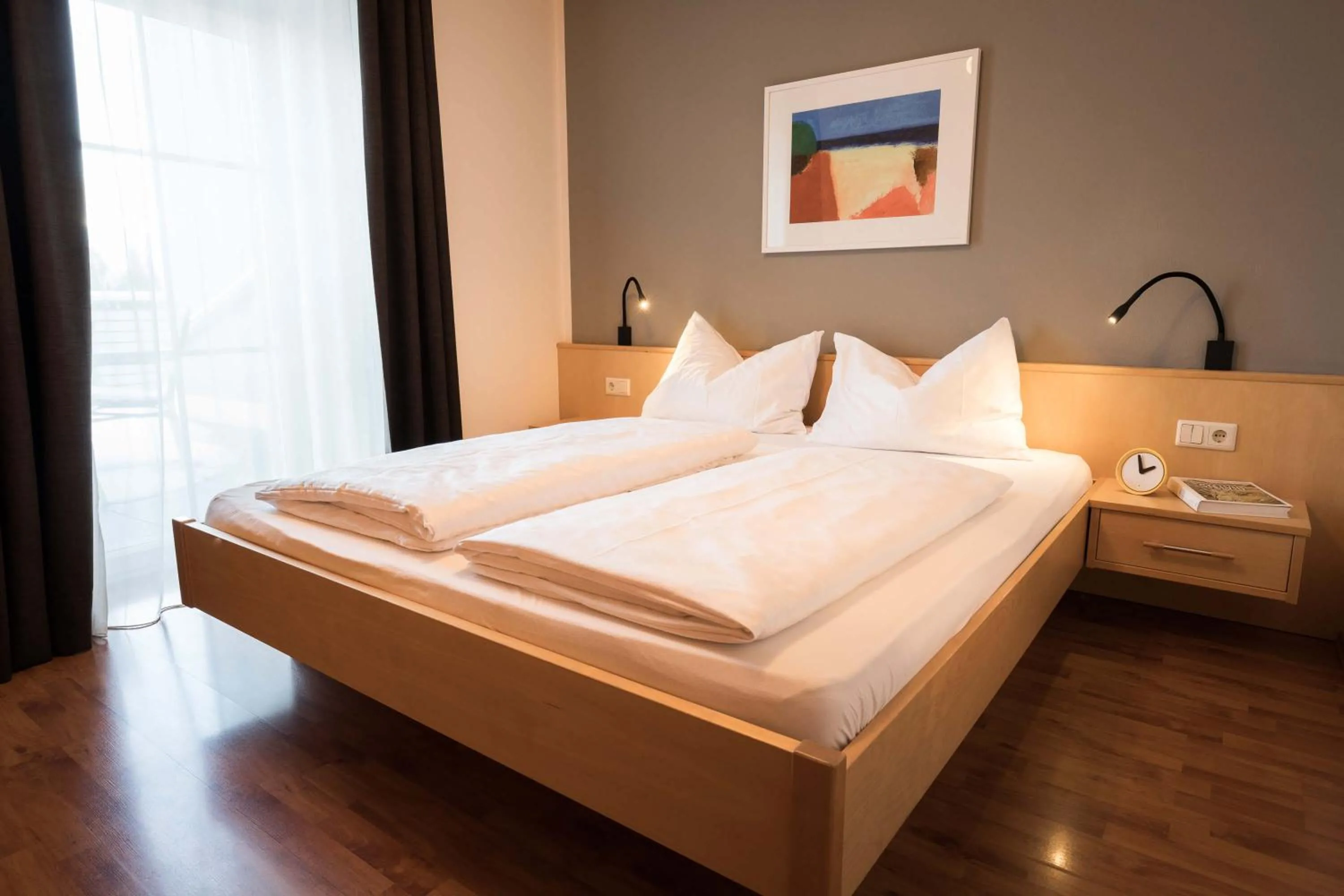 Bed in Sankt Johann Spa Suites & Apartments