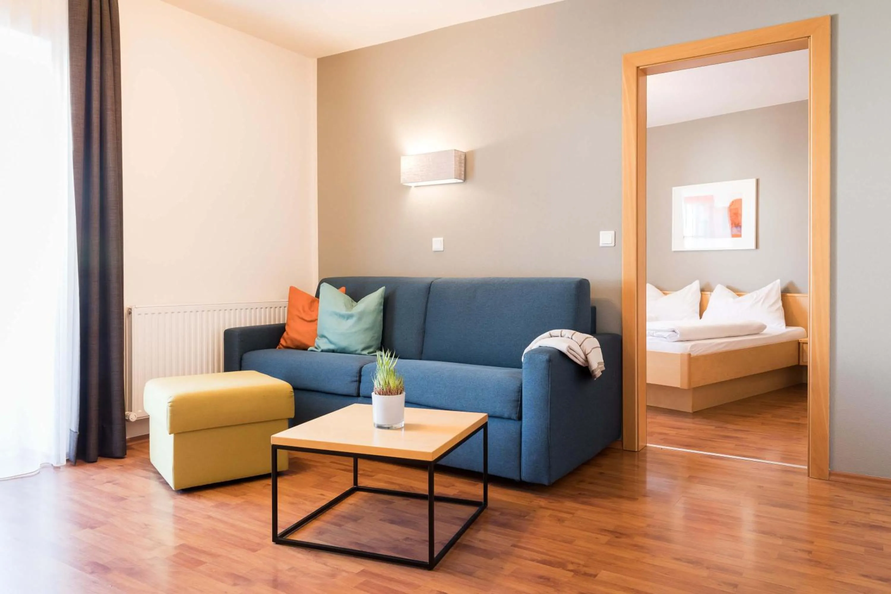 Living room, Bed in Sankt Johann Spa Suites & Apartments
