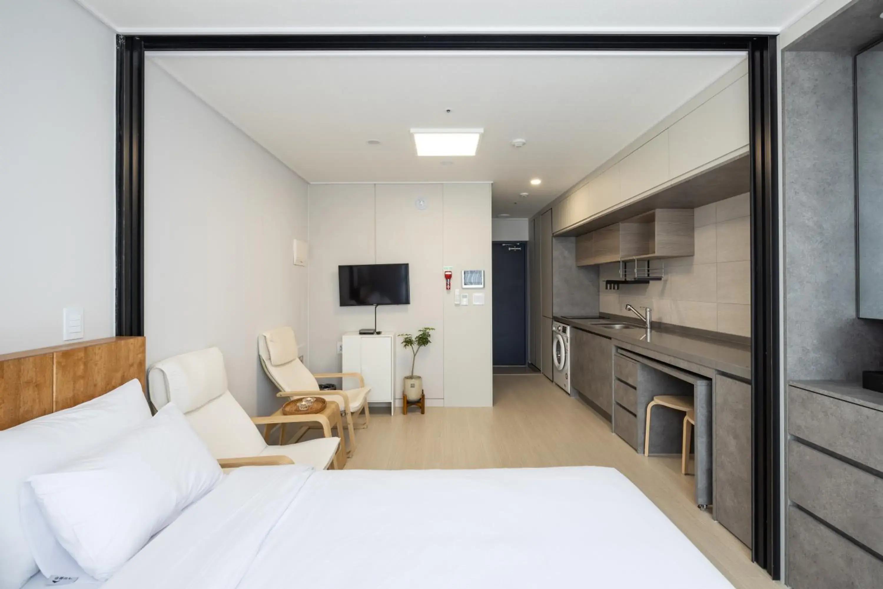 Photo of the whole room, Bed in Grand Bleu Hotel & Residence Photo of the whole room, Bed in Grand Bleu Hotel & Residence