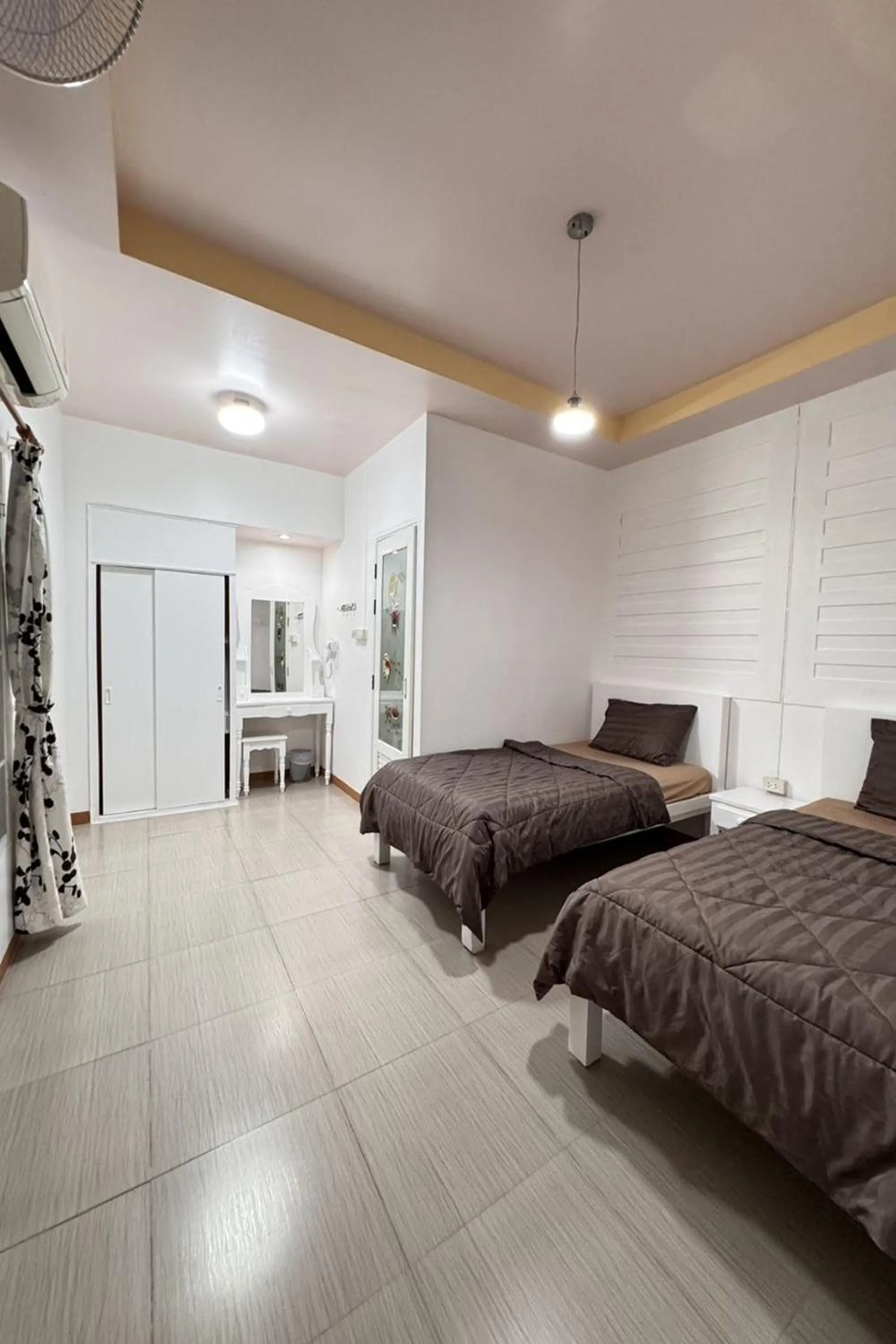 Bed in Ban Suan Suree Resort