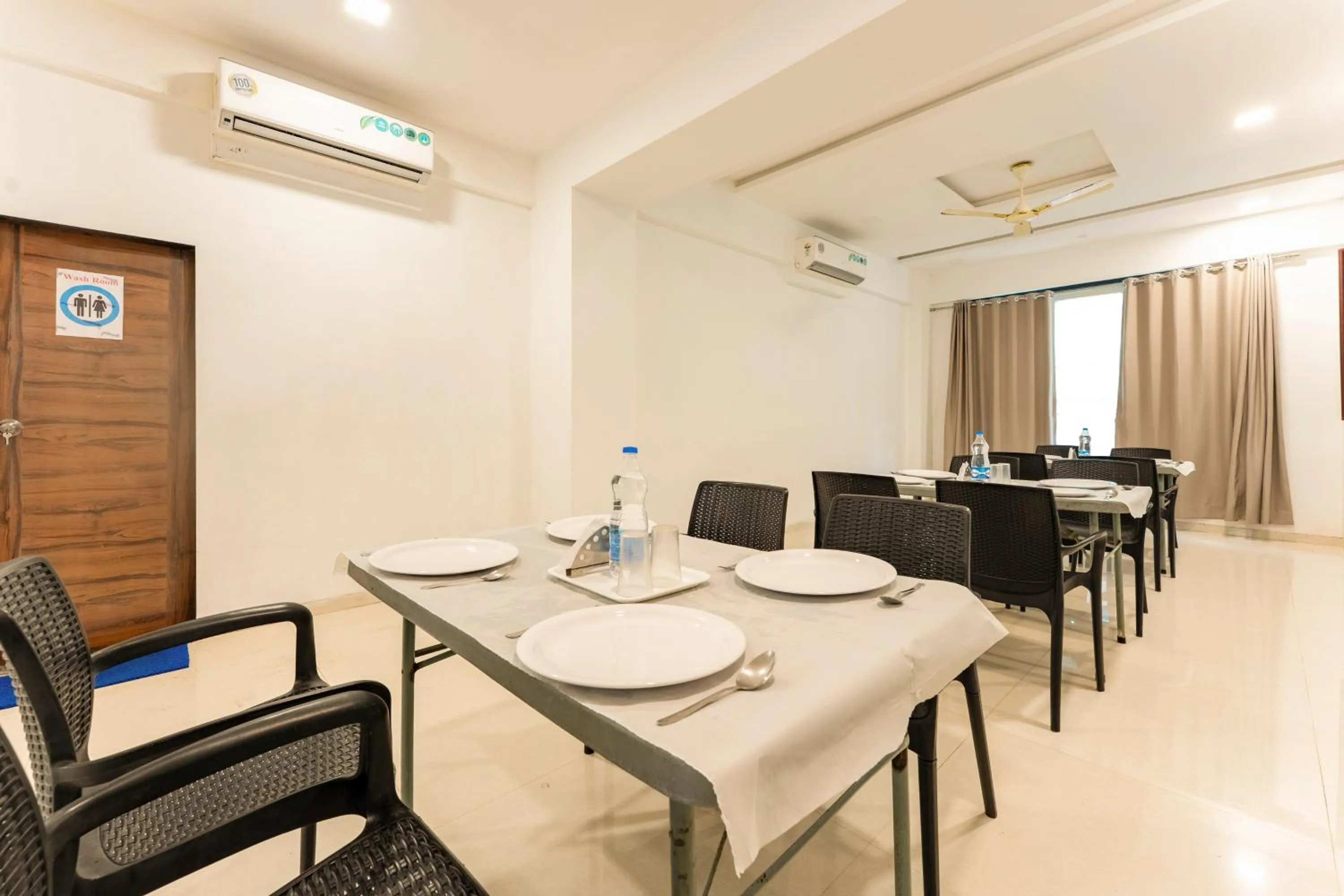 Dining area in Treebo Blue Roof, Kelwa