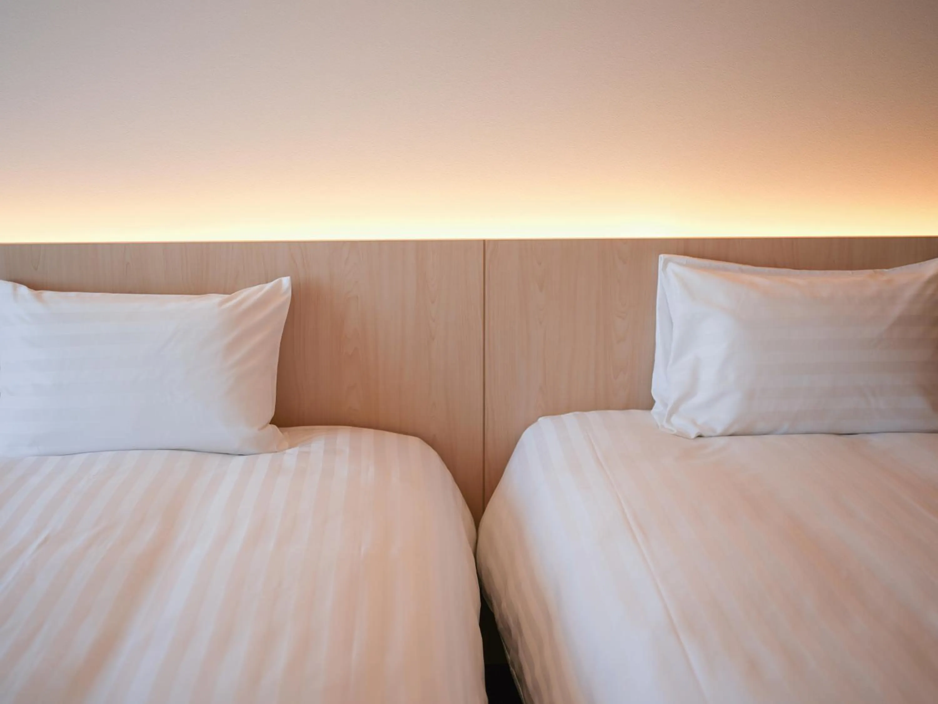 Bed in Dorsett by Agora Osaka Sakai