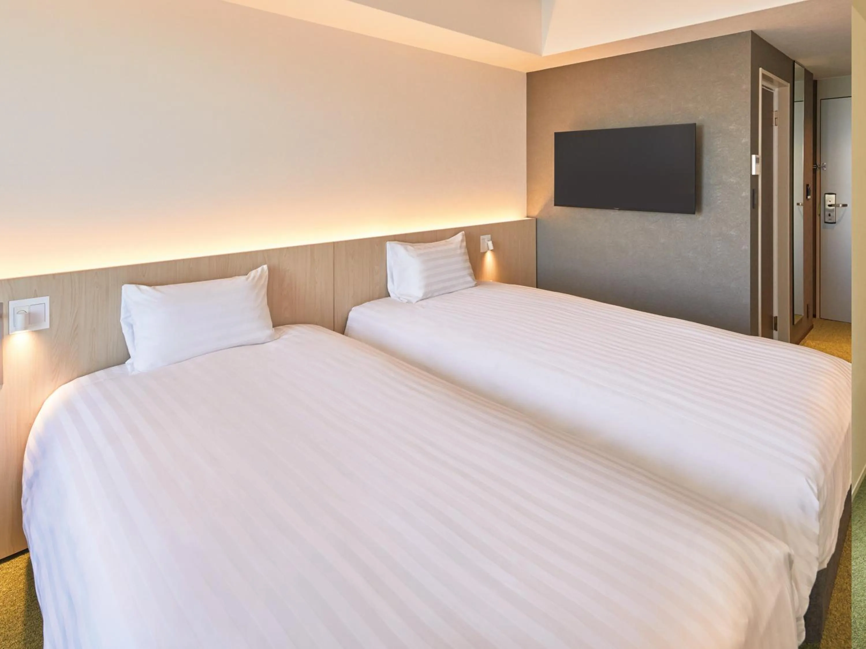 Bed in Dorsett by Agora Osaka Sakai