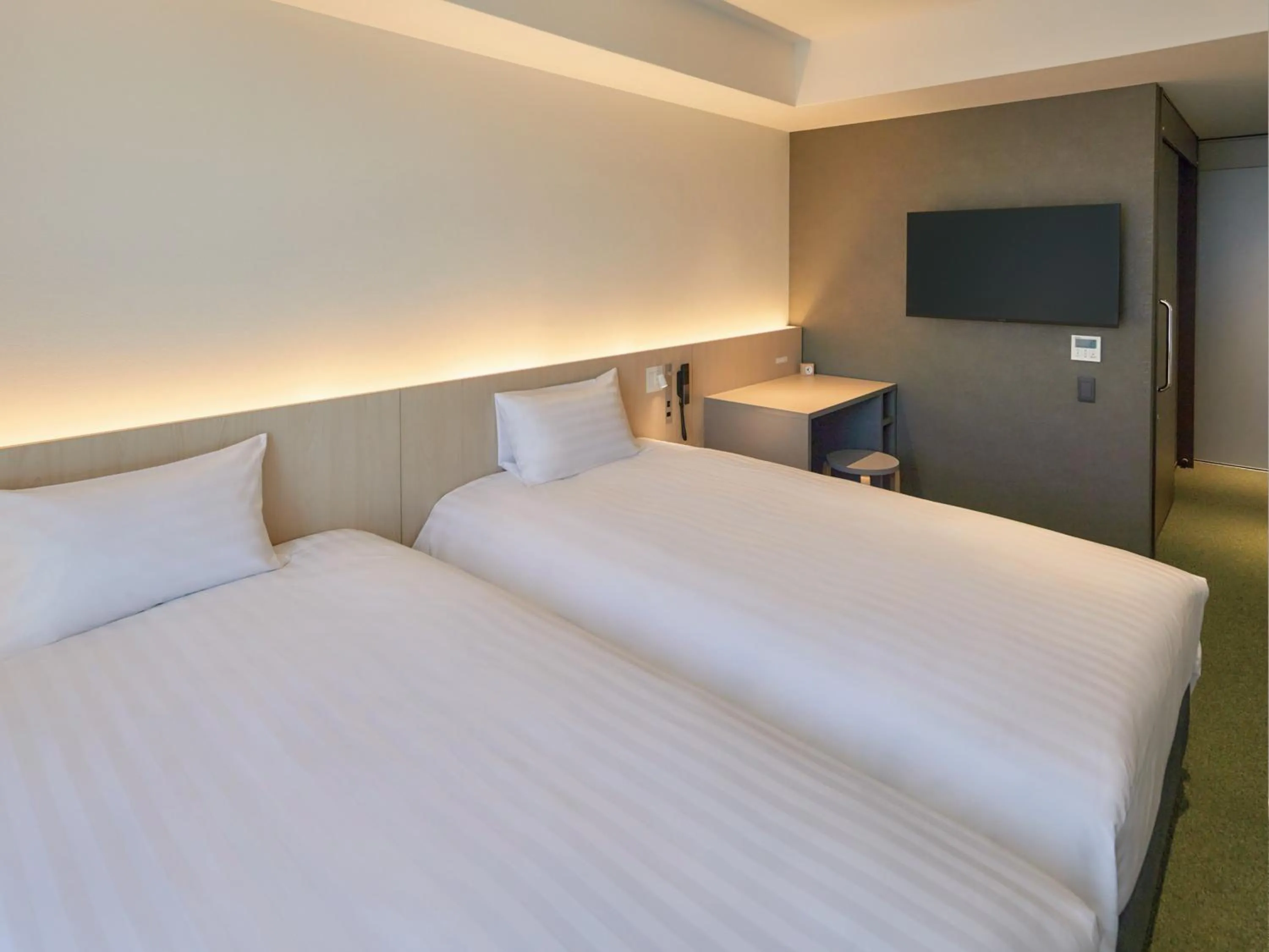 Bed in Dorsett by Agora Osaka Sakai