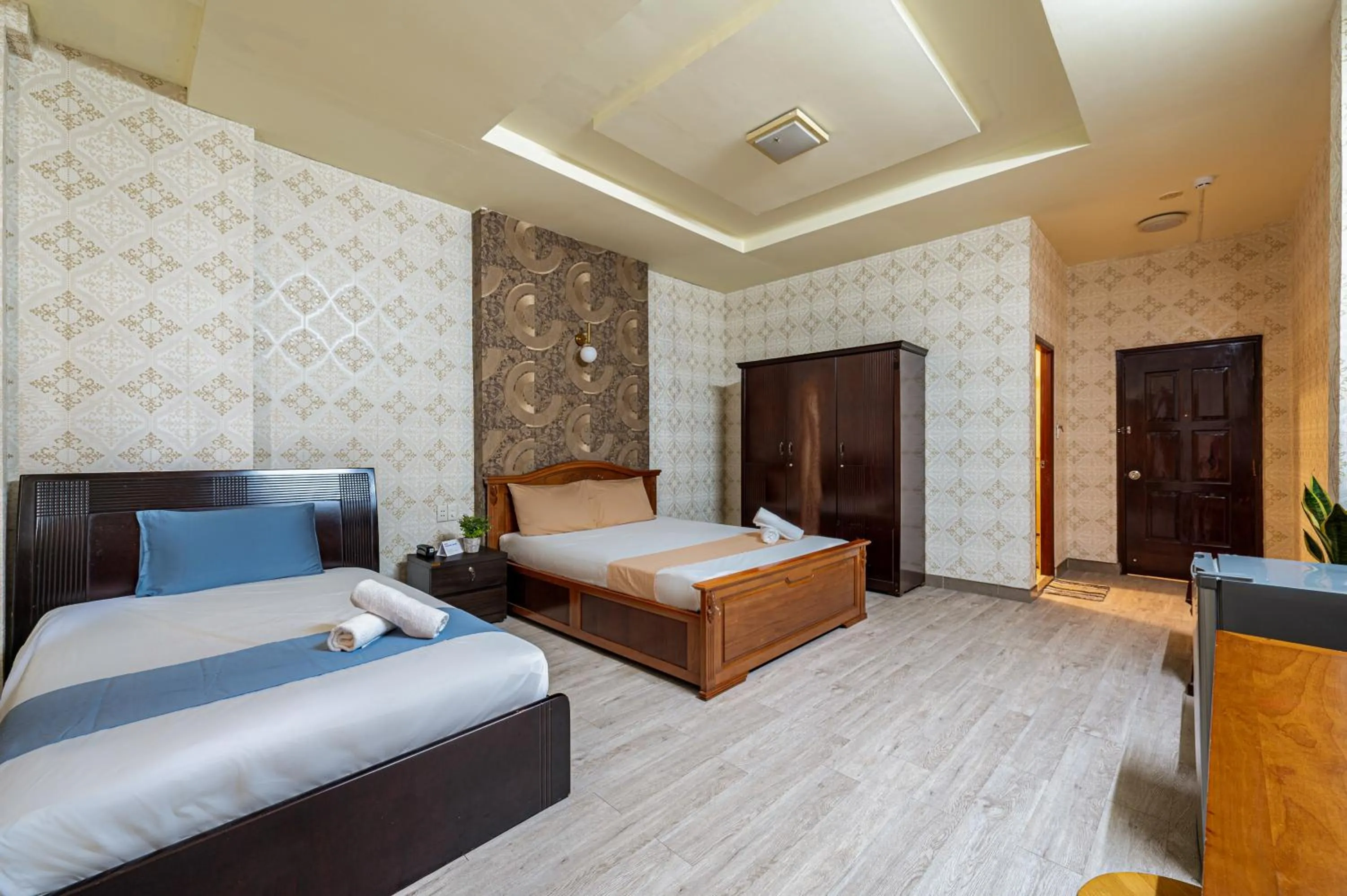 Bed in Hoàng Long Hotel By Cozrum