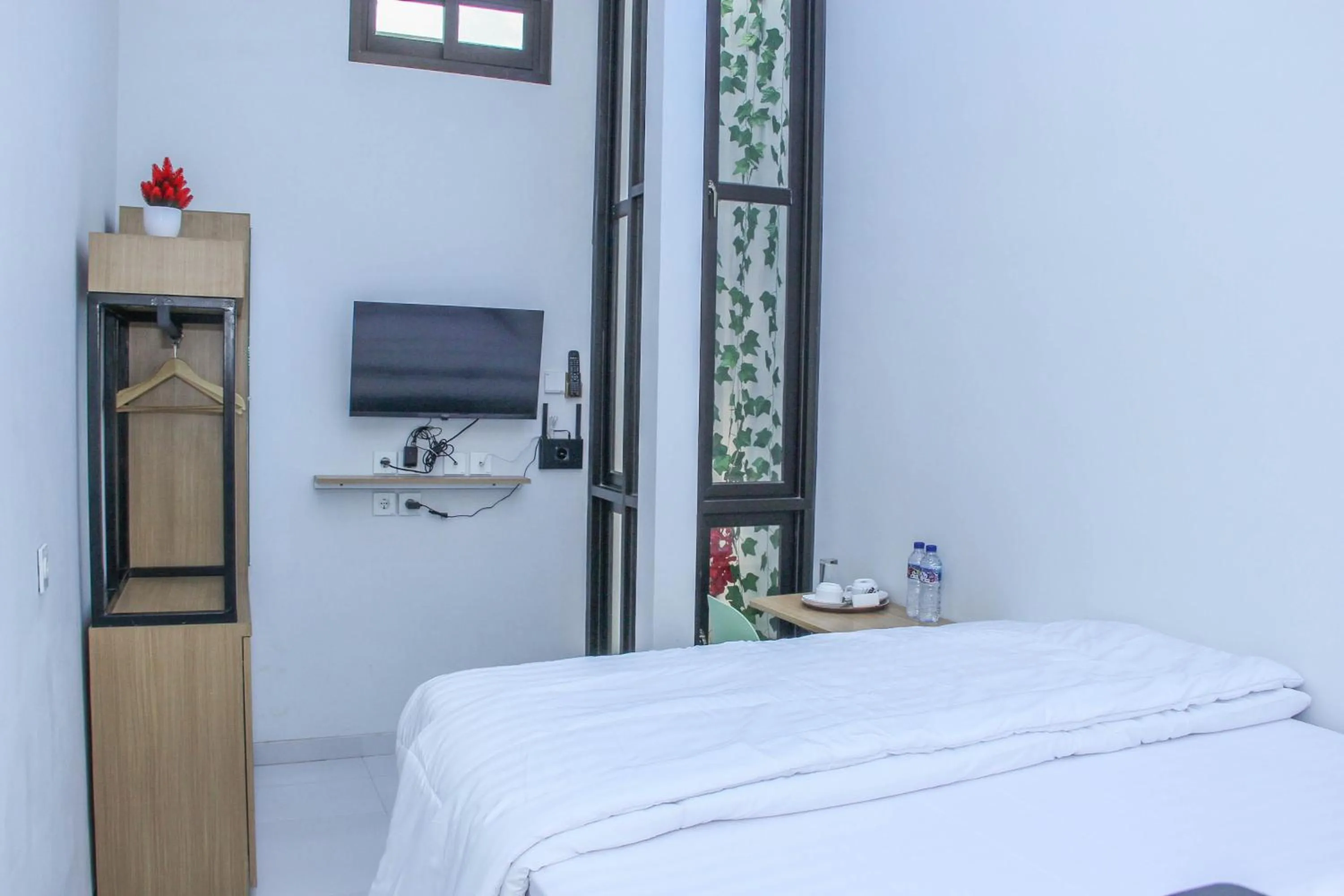 Bed in Laswi Syariah Guest House